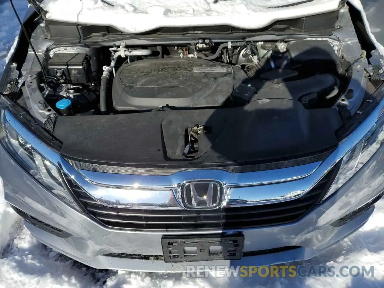 12 Photograph of a damaged car 5FNRL6H57KB114194 HONDA All Models 2019