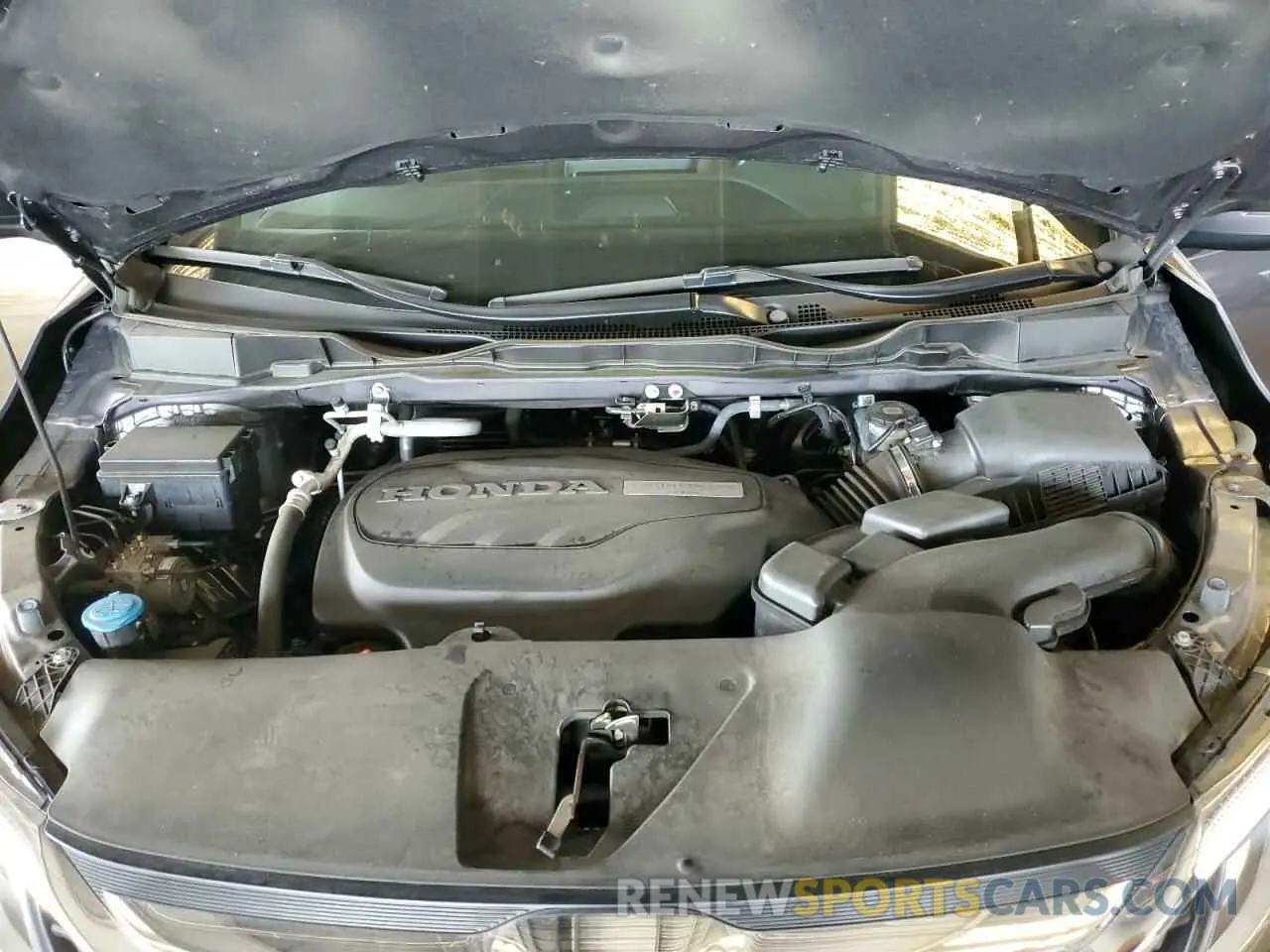 12 Photograph of a damaged car 5FNRL6H79KB069020 HONDA All Models 2019