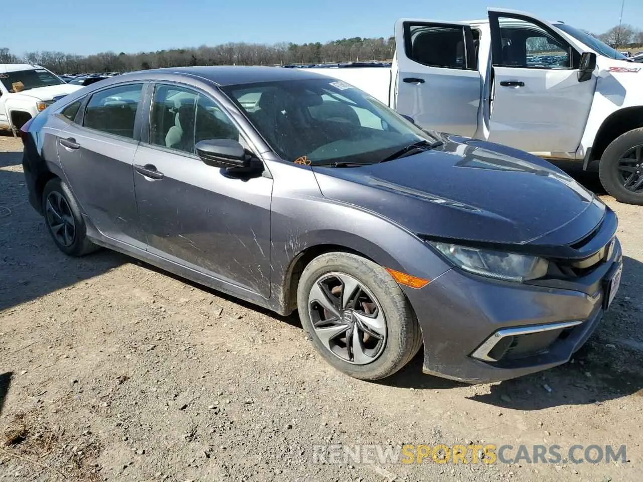 4 Photograph of a damaged car 19XFC2F67KE027473 HONDA CIVIC 2019
