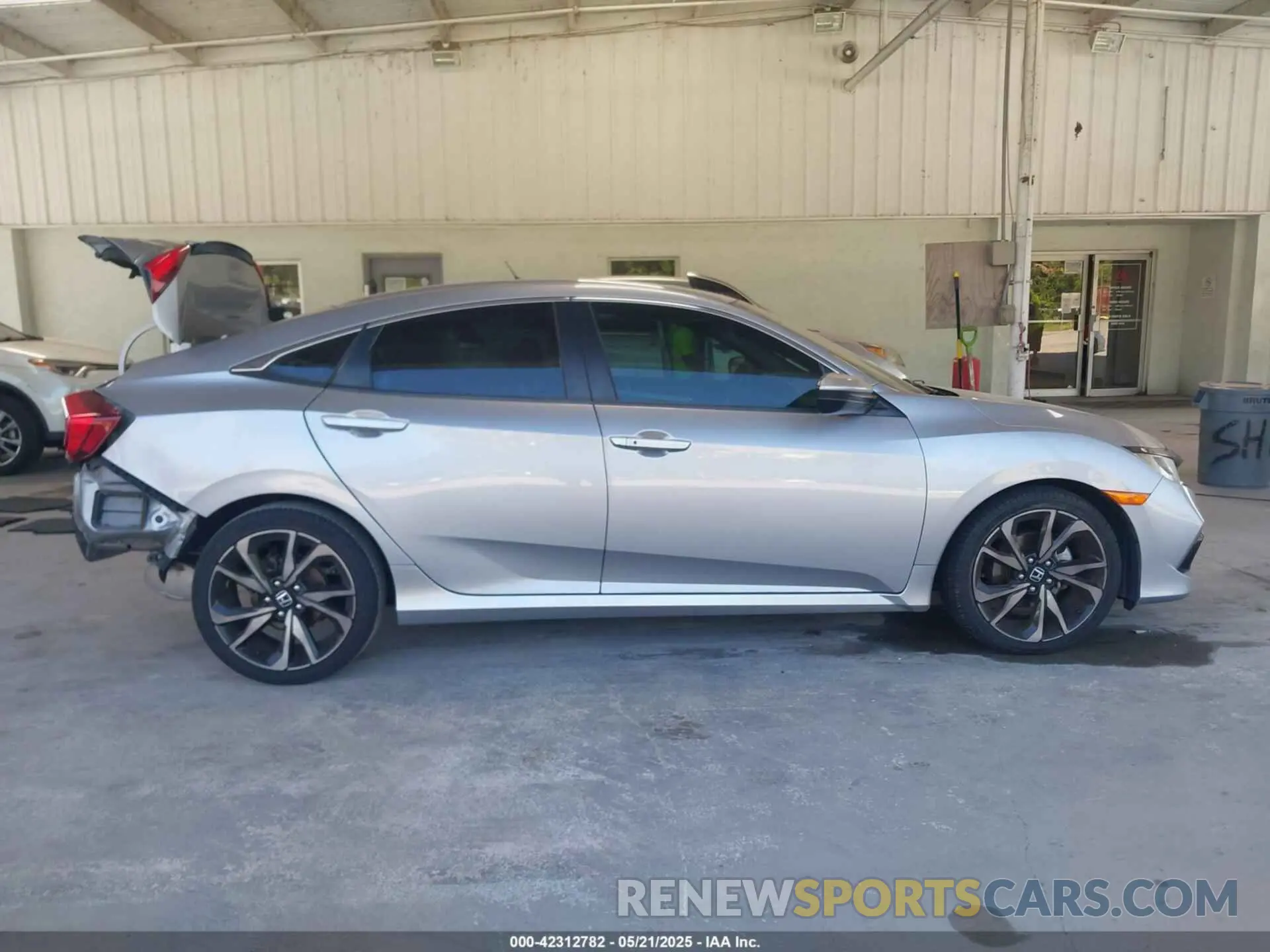 12 Photograph of a damaged car 2HGFC2F8XKH579802 HONDA CIVIC 2019