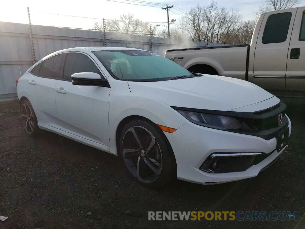 4 Photograph of a damaged car 19XFC1F31LE217464 HONDA CIVIC 2020