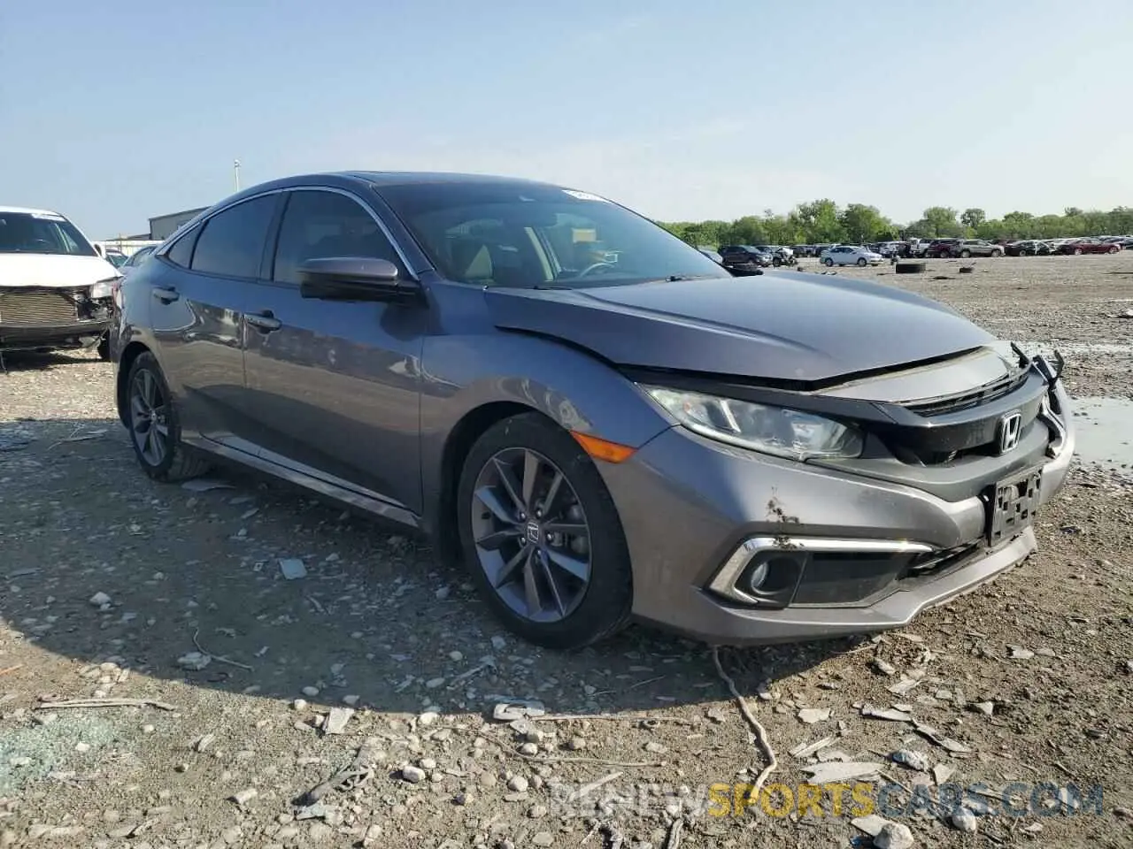 4 Photograph of a damaged car 19XFC1F33LE010932 HONDA CIVIC 2020