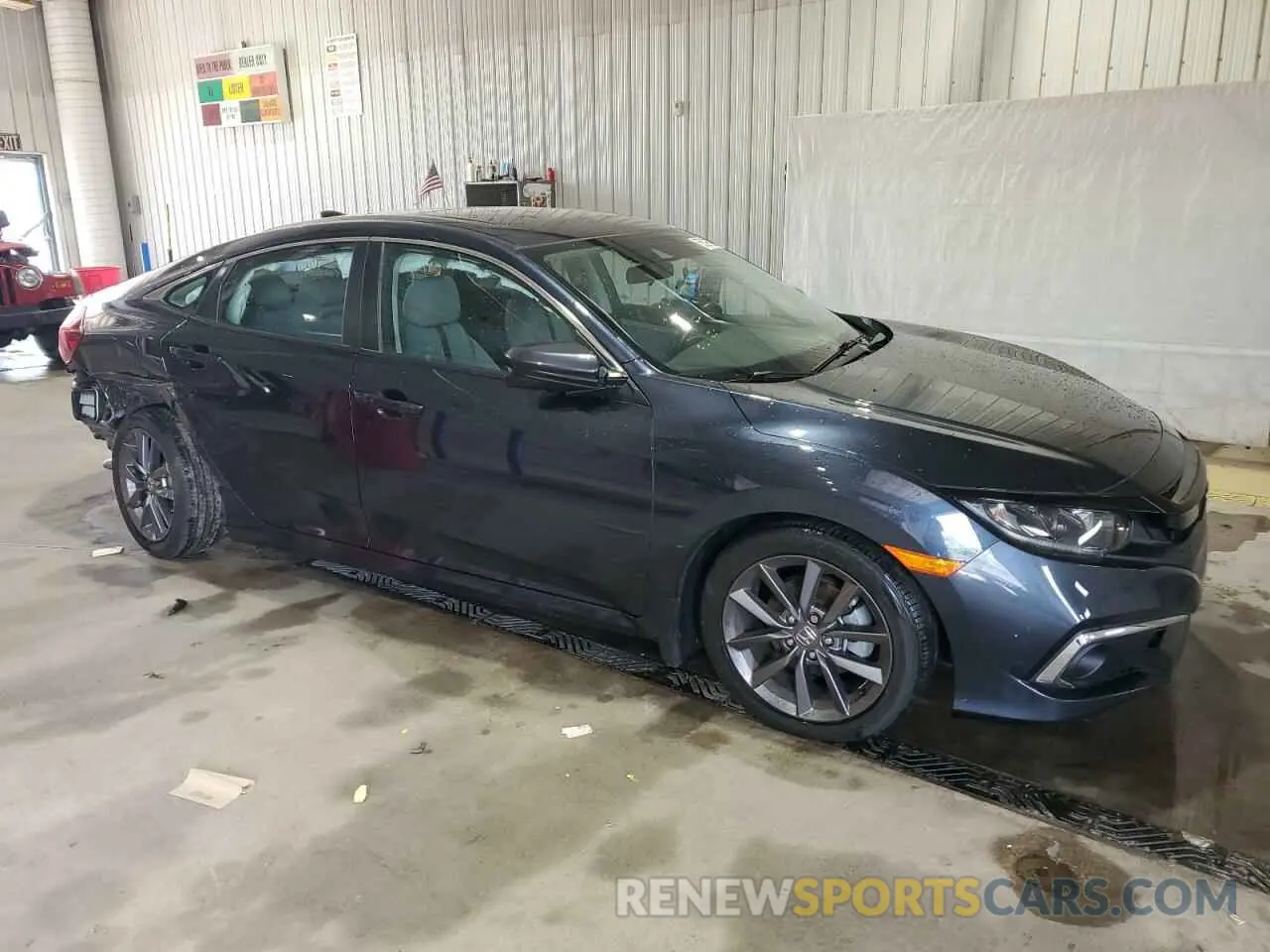 4 Photograph of a damaged car 19XFC1F35ME200670 HONDA CIVIC 2021
