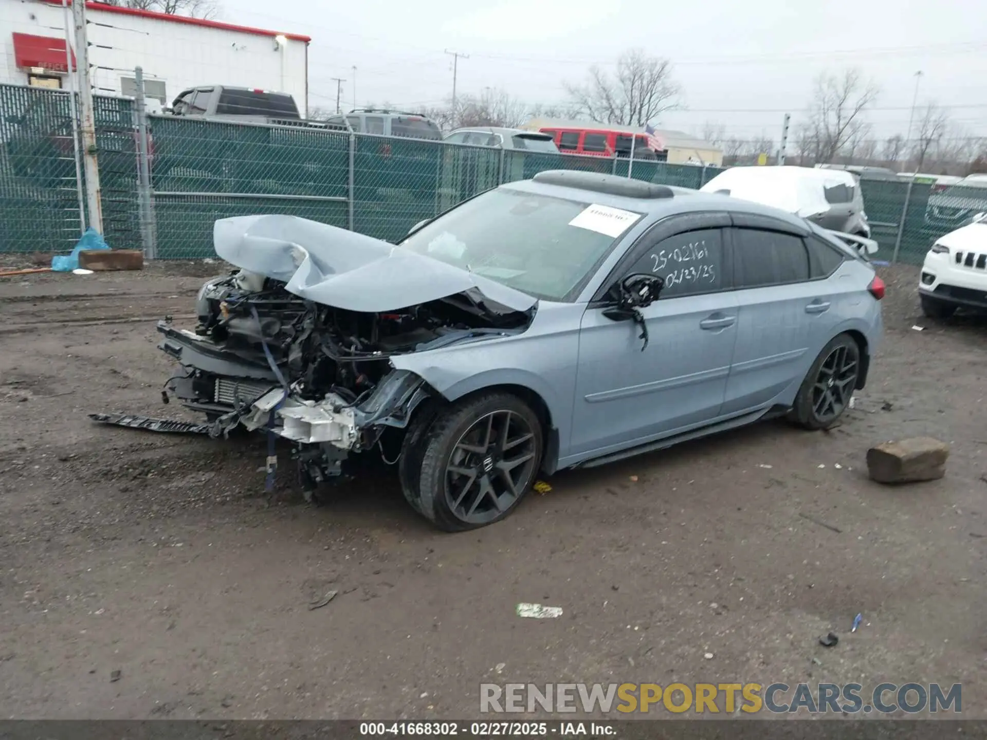 2 Фотография поврежденного автомобиля 19XFL1G89PE005976 HONDA CIVIC 2023