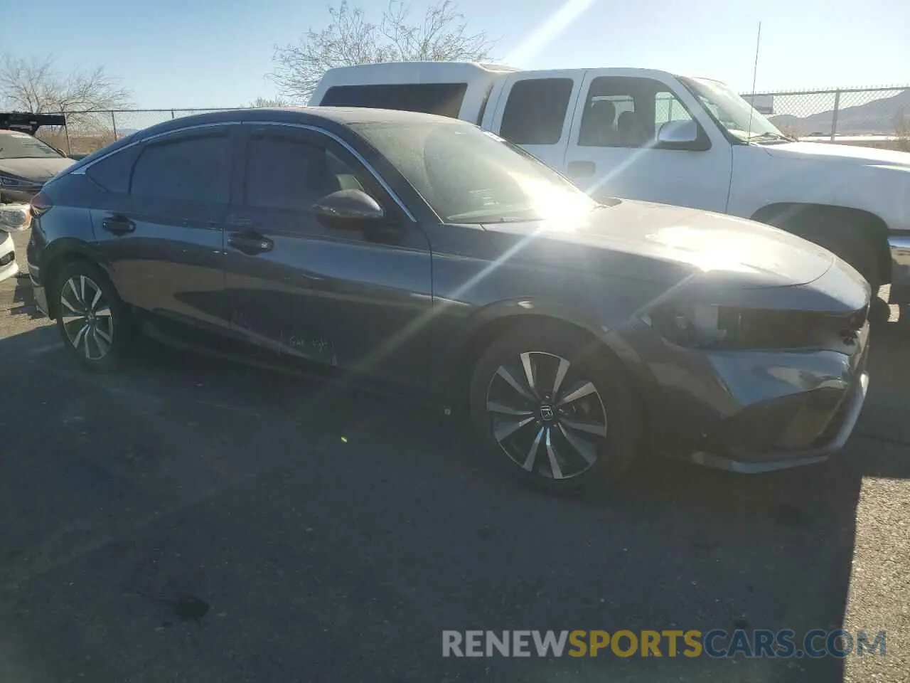 4 Photograph of a damaged car 19XFL1H72PE004237 HONDA CIVIC 2023