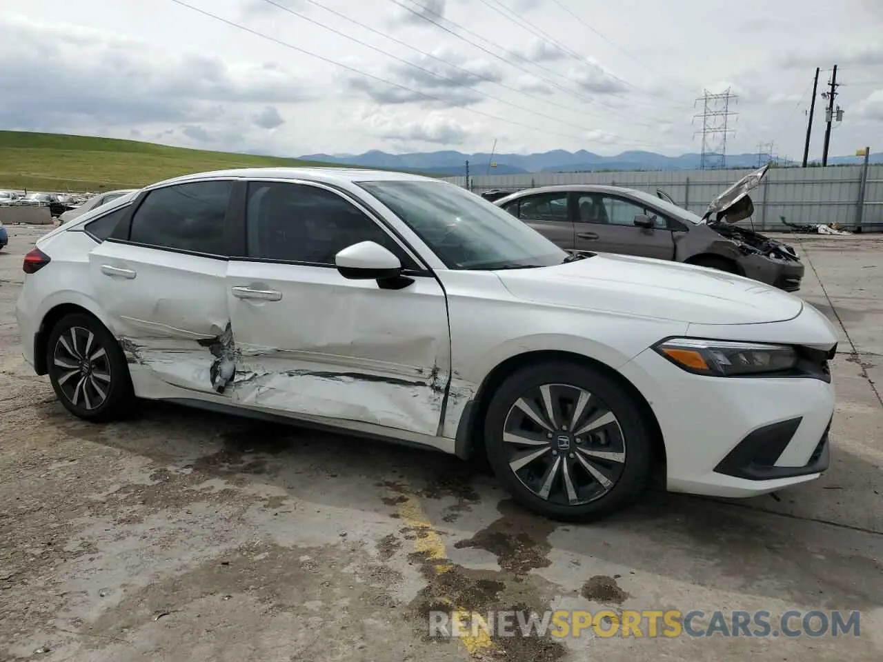 4 Photograph of a damaged car 19XFL1H77PE004864 HONDA CIVIC 2023