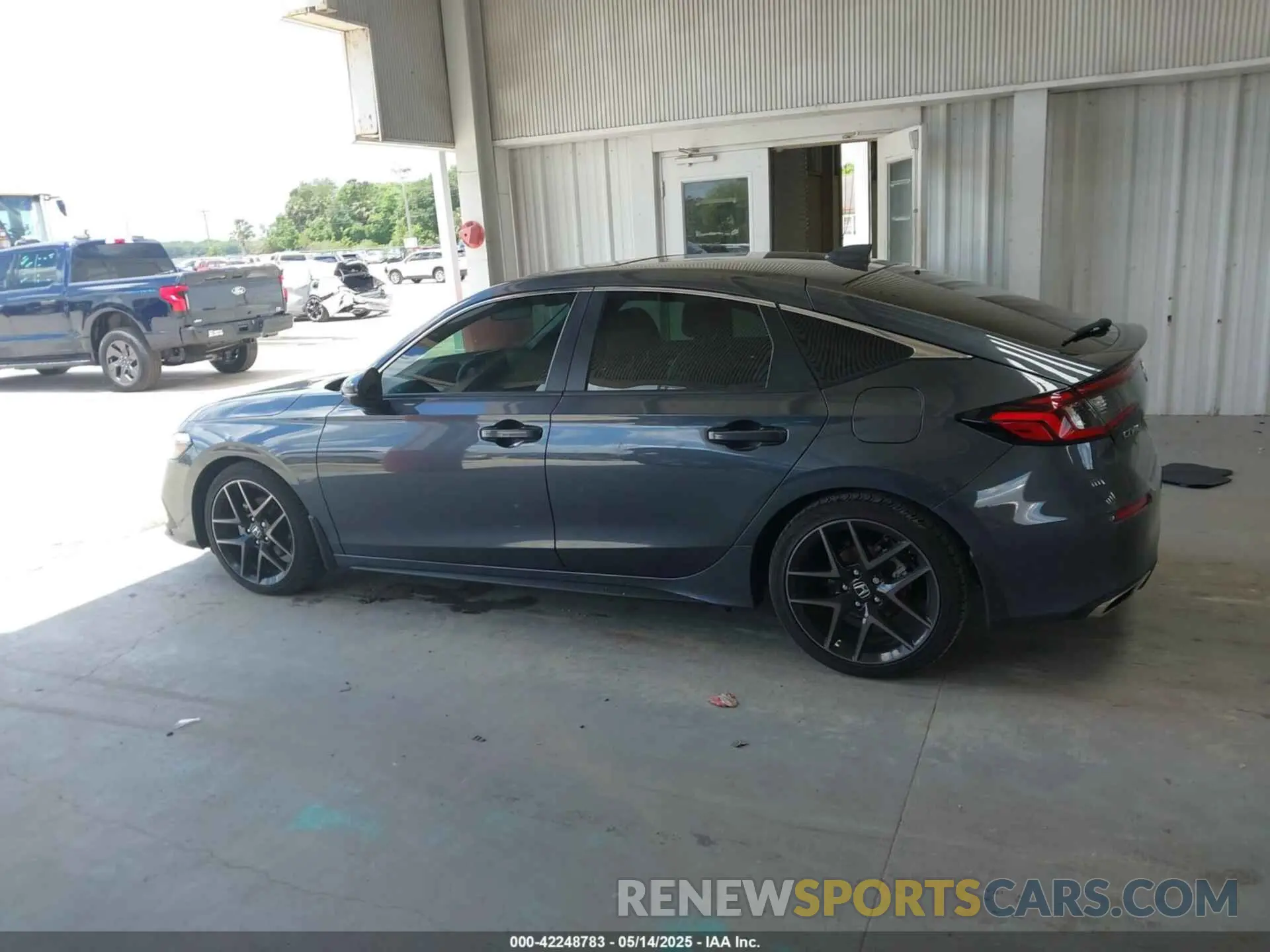 14 Photograph of a damaged car 19XFL1H85PE012387 HONDA CIVIC 2023