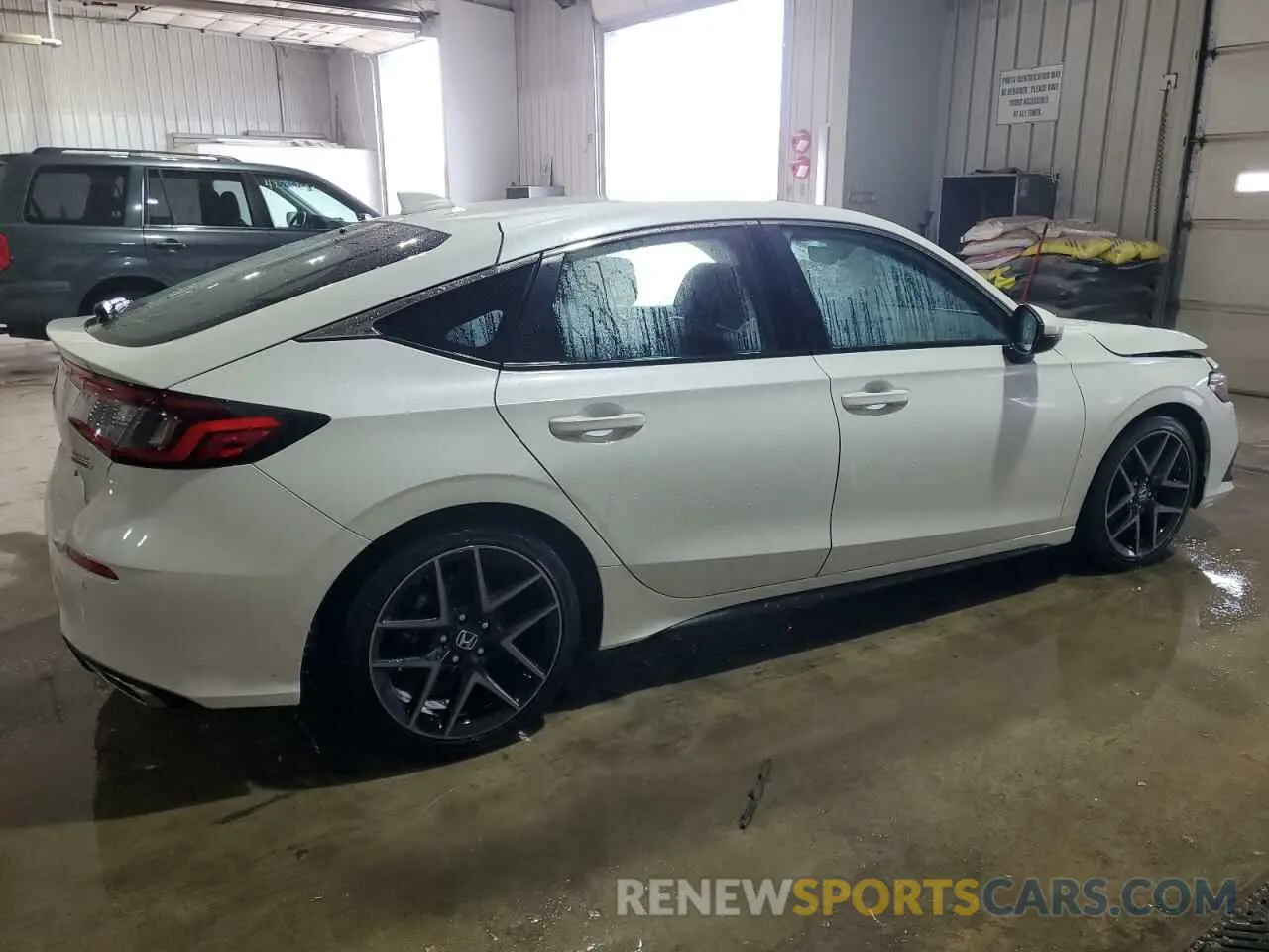 3 Фотография поврежденного автомобиля 19XFL1H86PE000555 HONDA CIVIC 2023
