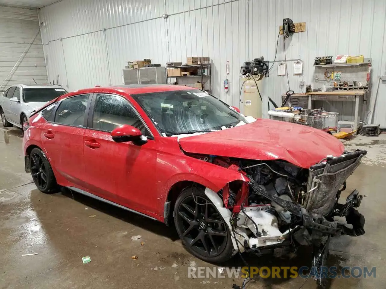 4 Photograph of a damaged car 19XFL1H86PE011054 HONDA CIVIC 2023