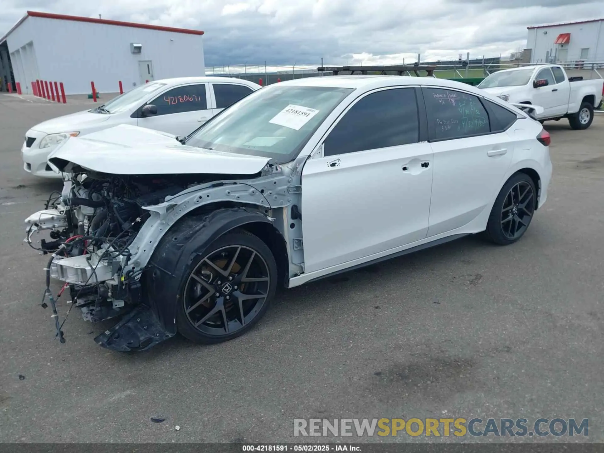 2 Photograph of a damaged car 19XFL1H87PE002914 HONDA CIVIC 2023