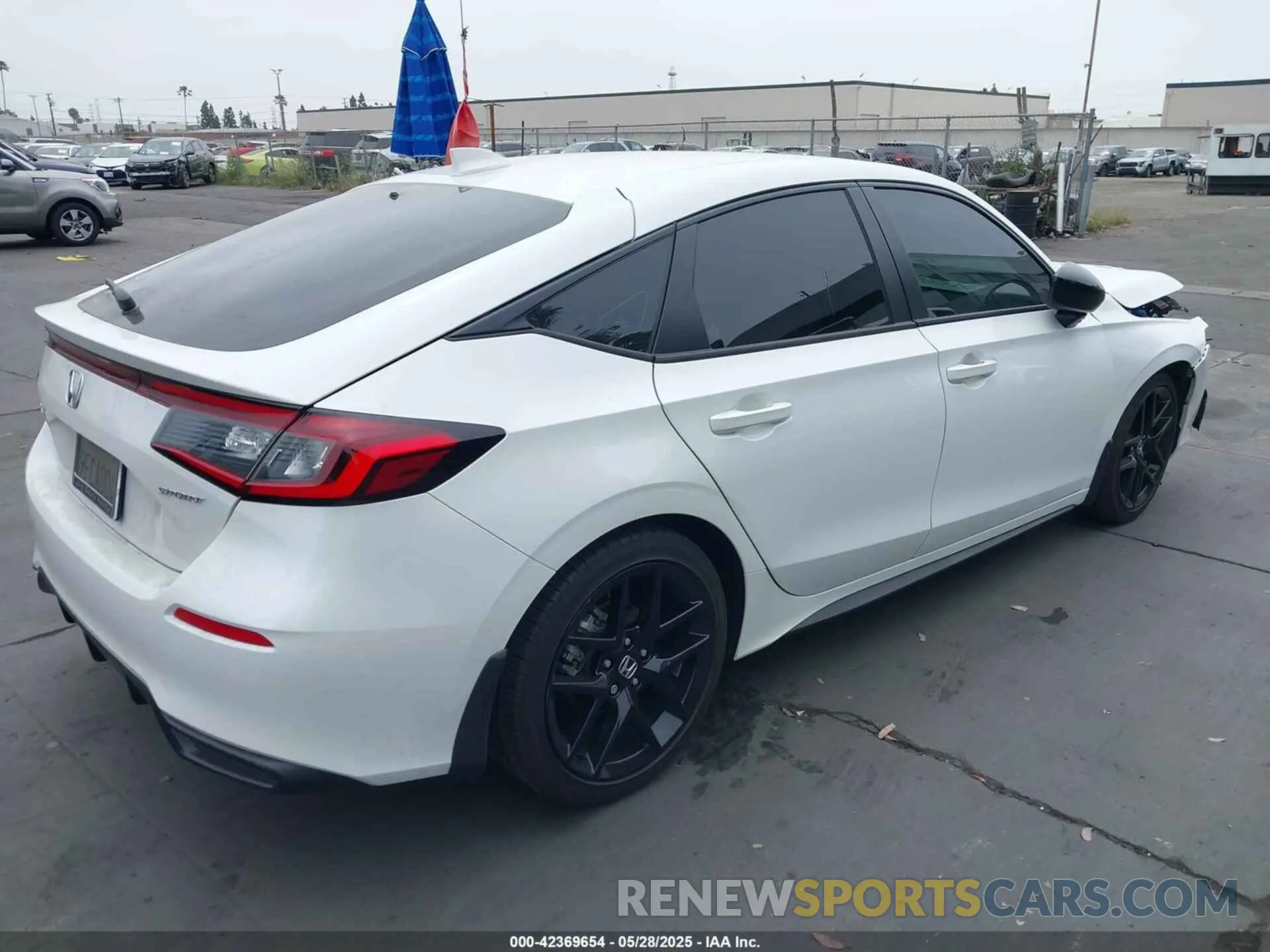 4 Photograph of a damaged car 19XFL2H87PE004331 HONDA CIVIC 2023