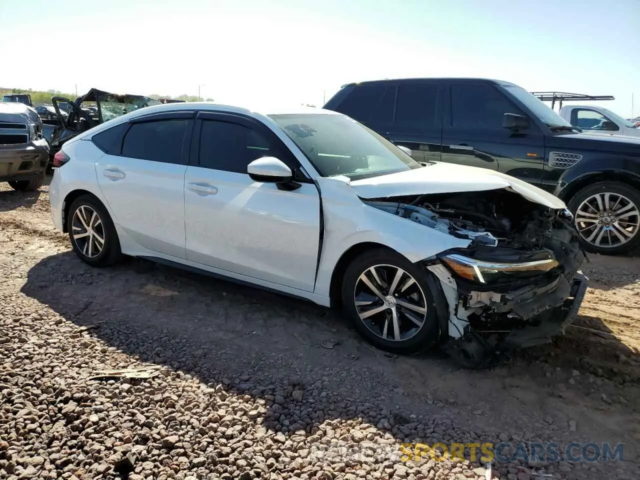 4 Photograph of a damaged car 19XFL2H50RE015549 HONDA CIVIC 2024
