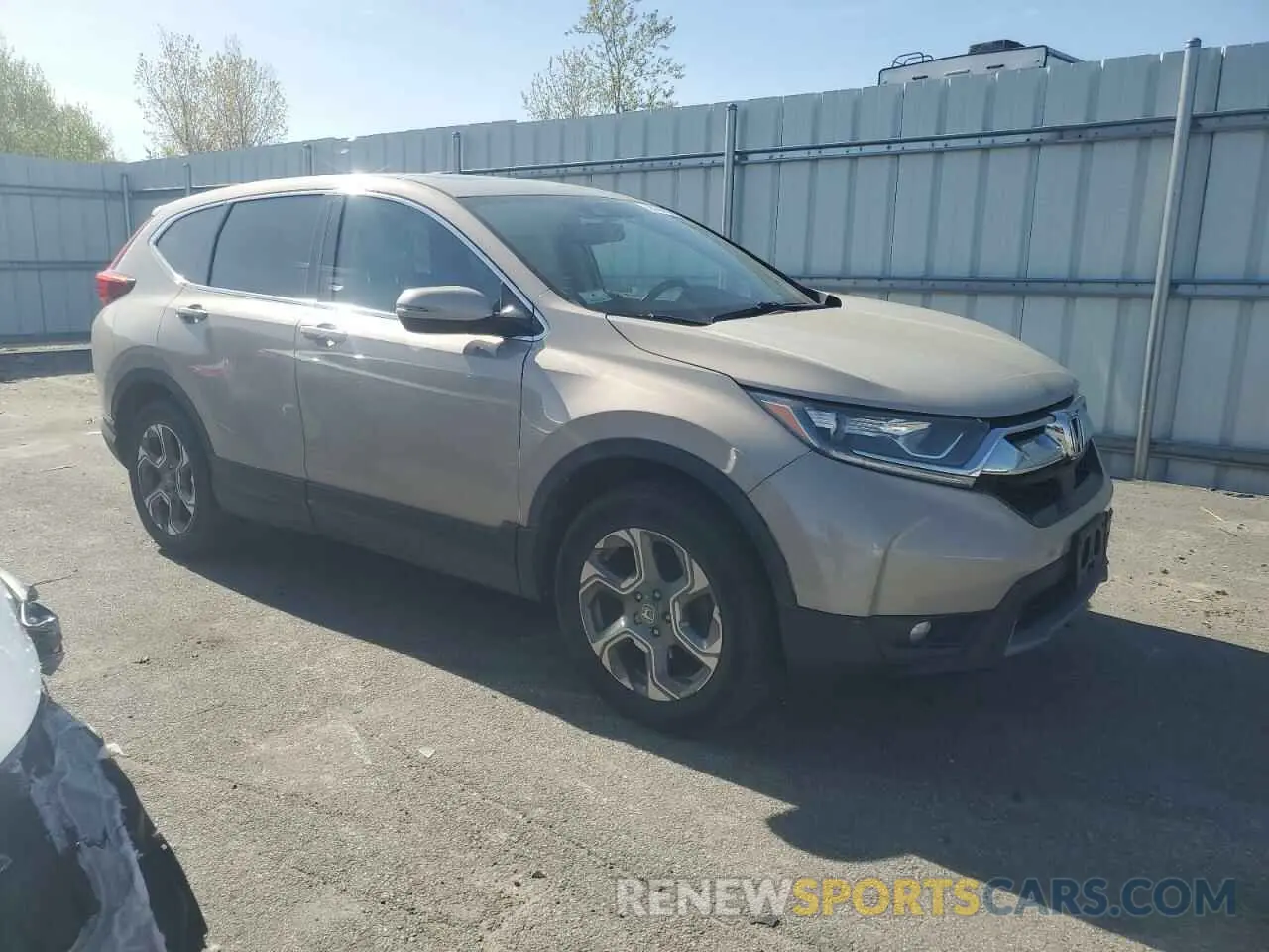 4 Photograph of a damaged car 2HKRW2H89KH612909 HONDA CRV 2019