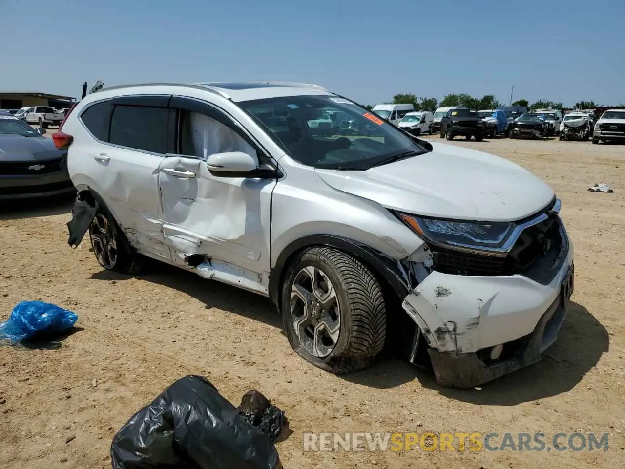 4 Photograph of a damaged car 2HKRW2H93KH642660 HONDA CRV 2019