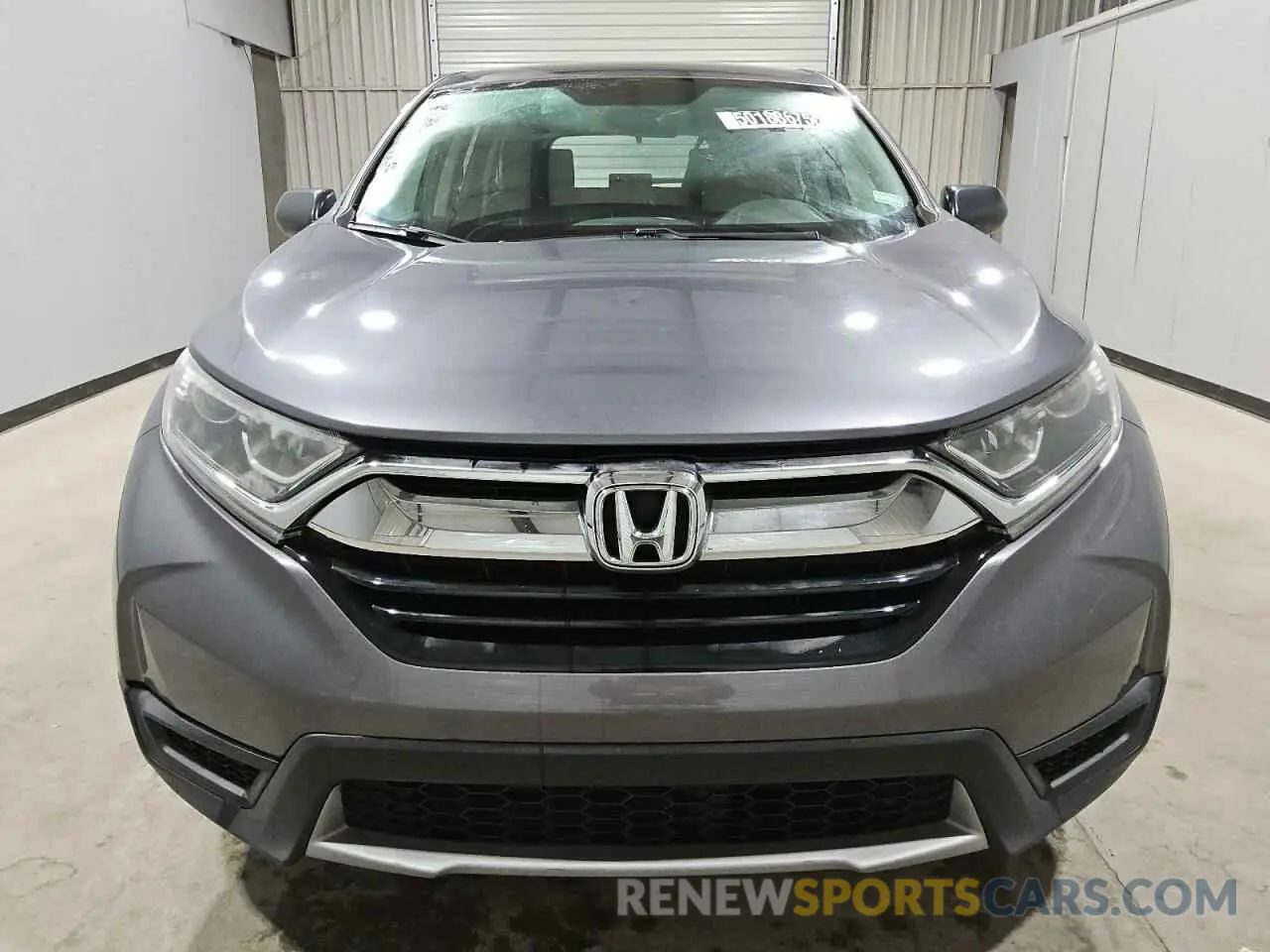 5 Photograph of a damaged car 2HKRW5H31KH417621 HONDA CRV 2019