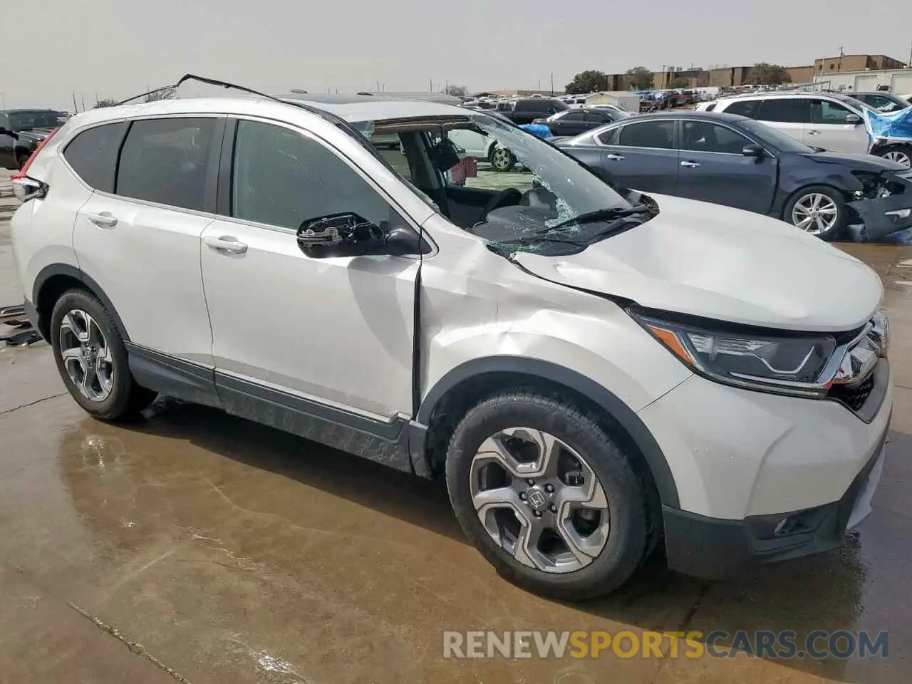 4 Фотография поврежденного автомобиля 5J6RW1H51KA039098 HONDA CRV 2019
