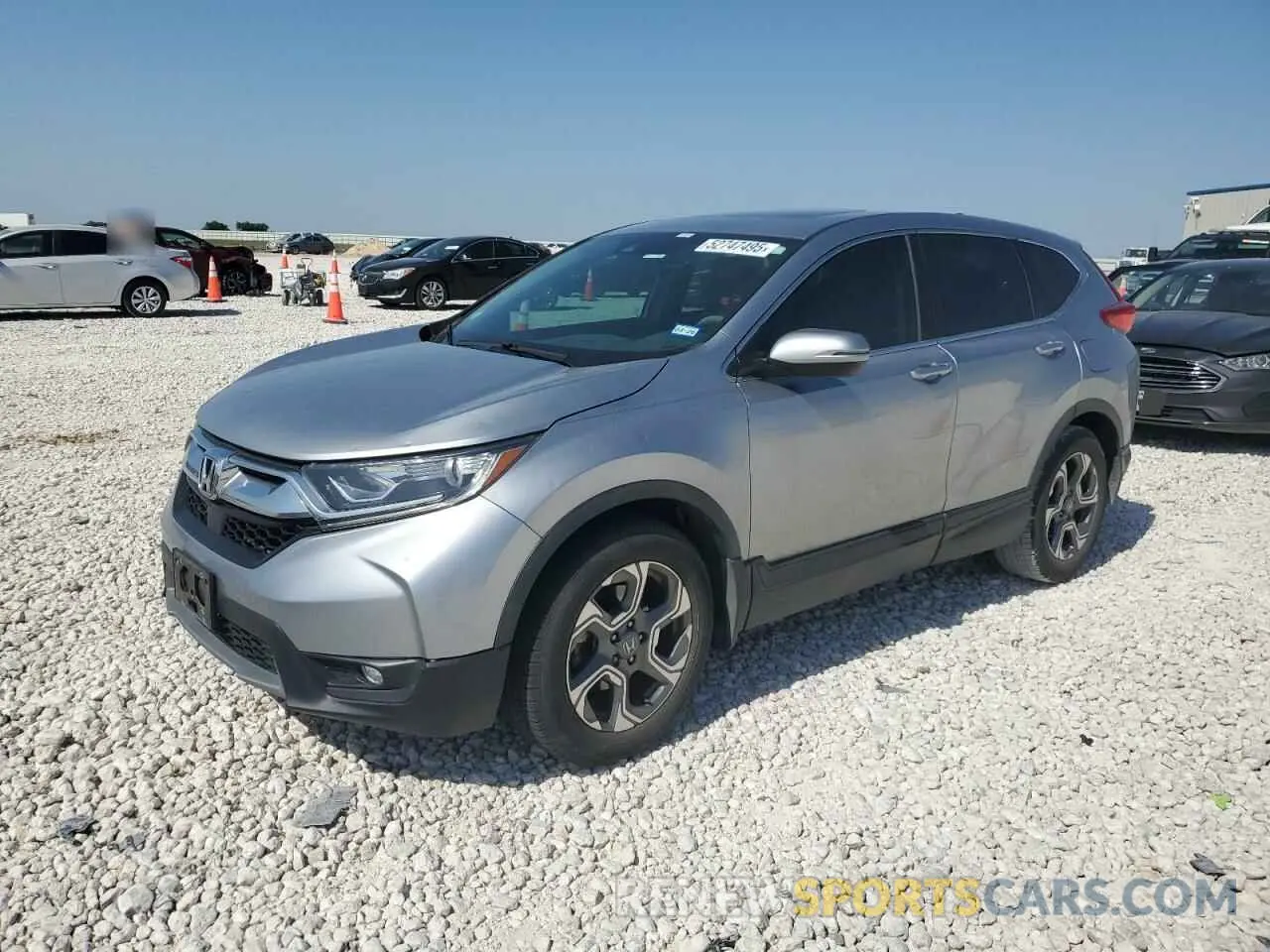 1 Photograph of a damaged car 5J6RW1H52KA016199 HONDA CRV 2019