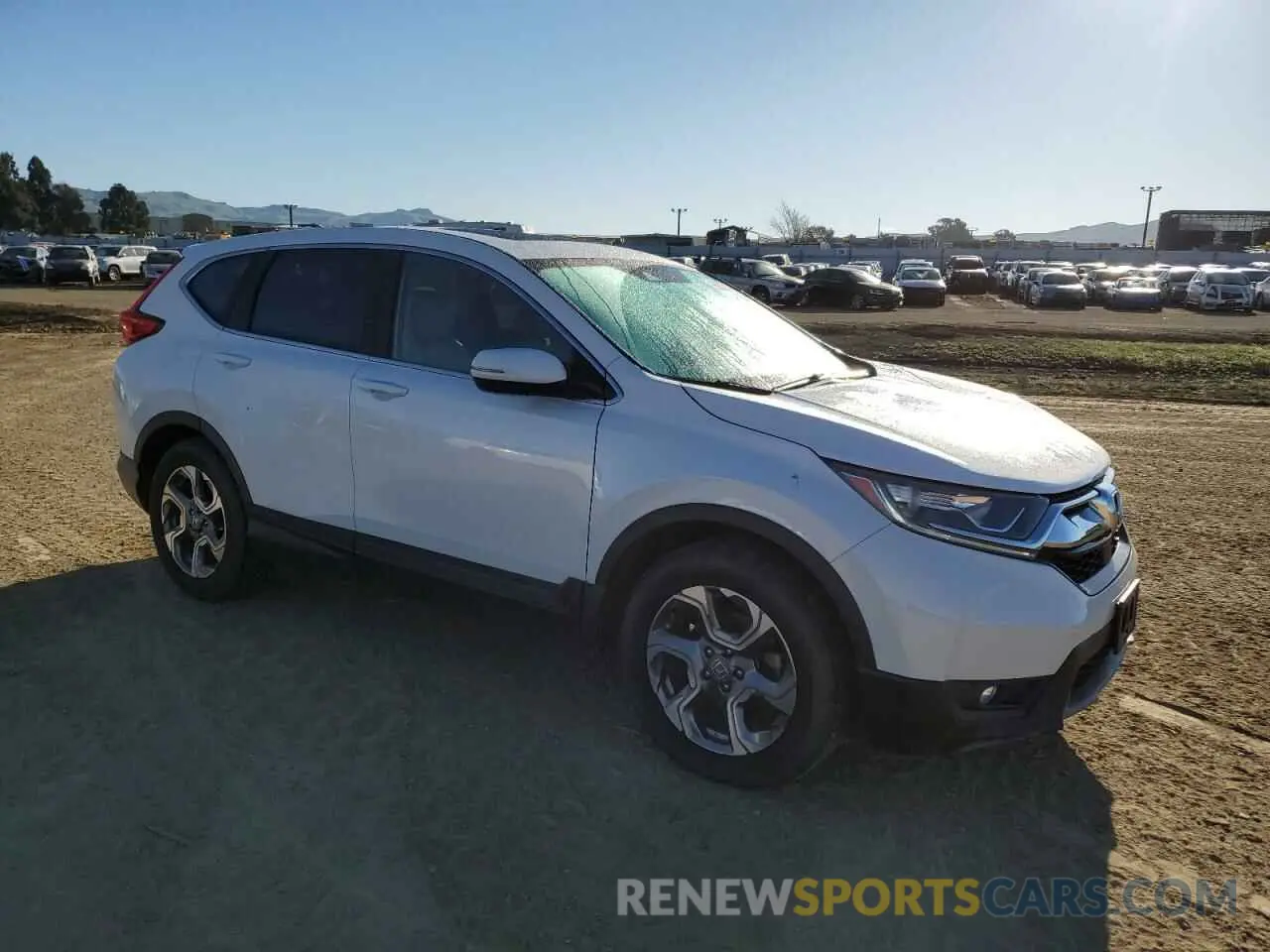 4 Photograph of a damaged car 5J6RW1H85KA037820 HONDA CRV 2019