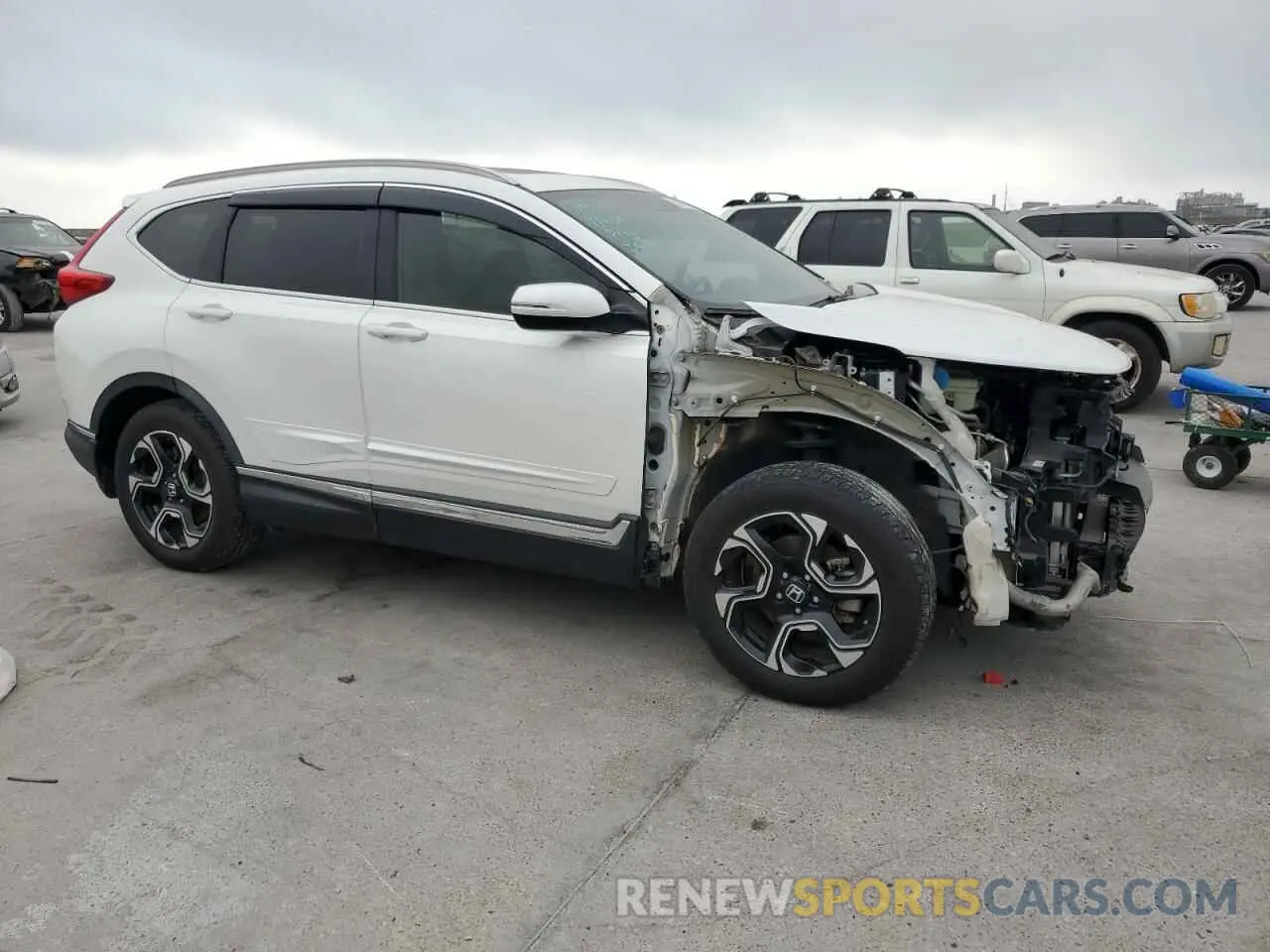4 Photograph of a damaged car 5J6RW1H90KL001563 HONDA CRV 2019