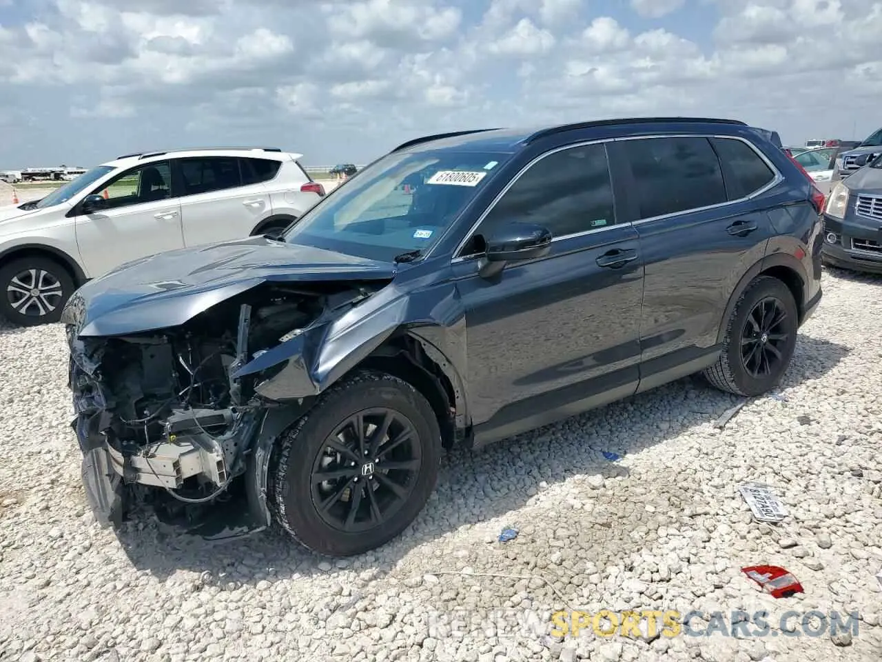 1 Photograph of a damaged car 2HKRS5H56PH702867 HONDA CRV 2023