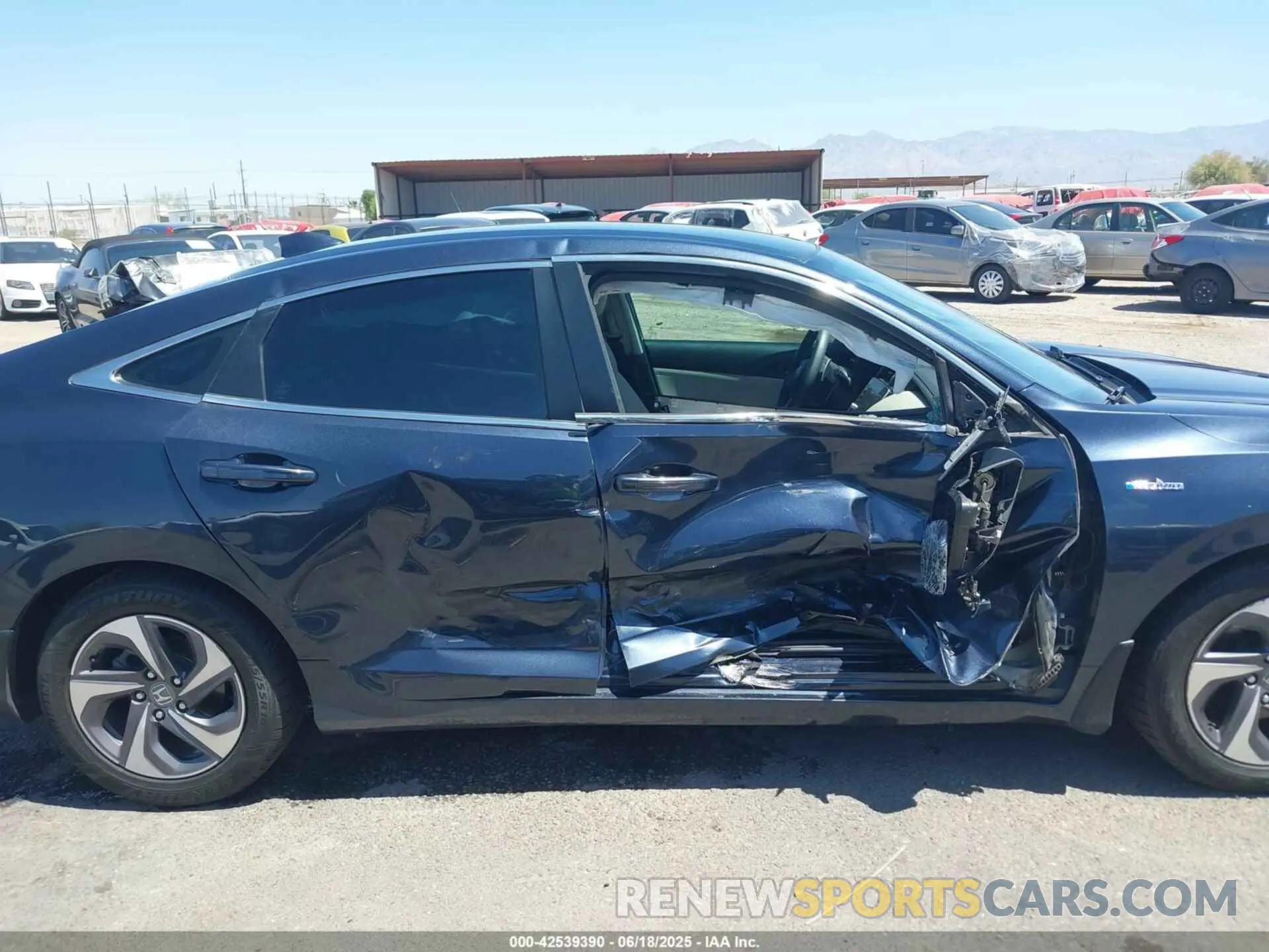 12 Photograph of a damaged car 19XZE4F51KE018827 HONDA INSIGHT 2019
