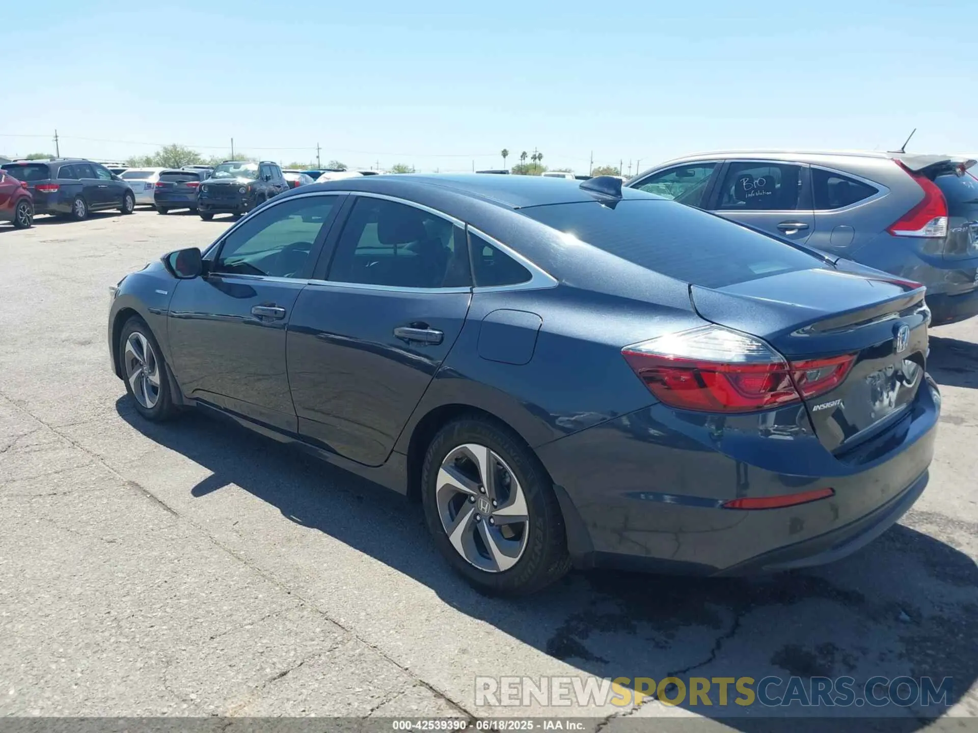 3 Photograph of a damaged car 19XZE4F51KE018827 HONDA INSIGHT 2019