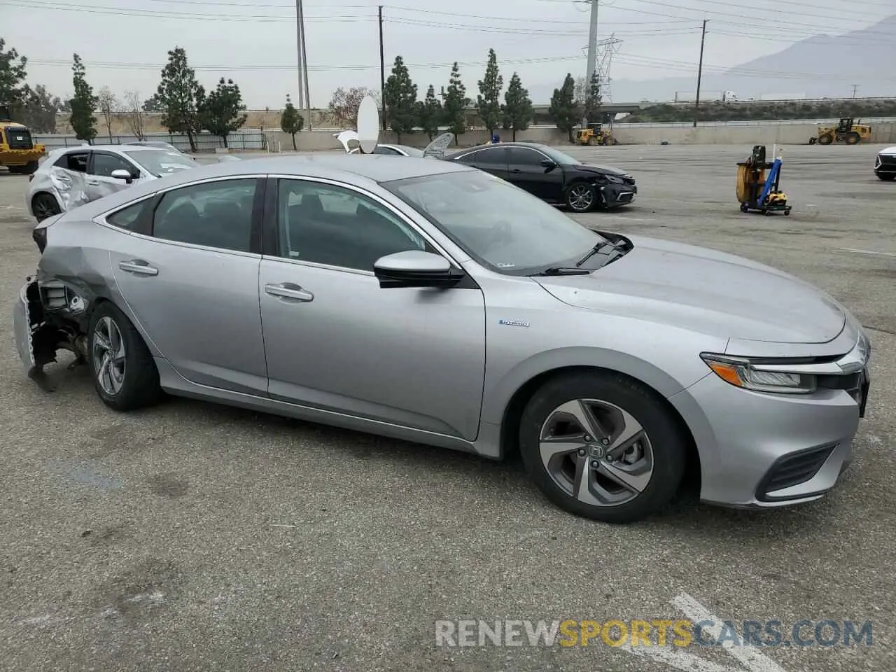 4 Photograph of a damaged car 19XZE4F51KE029343 HONDA INSIGHT 2019