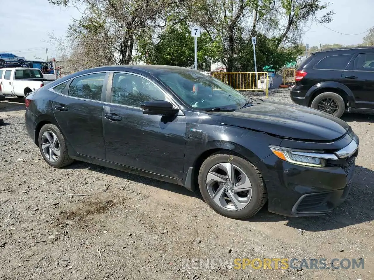 4 Photograph of a damaged car 19XZE4F53KE012804 HONDA INSIGHT 2019