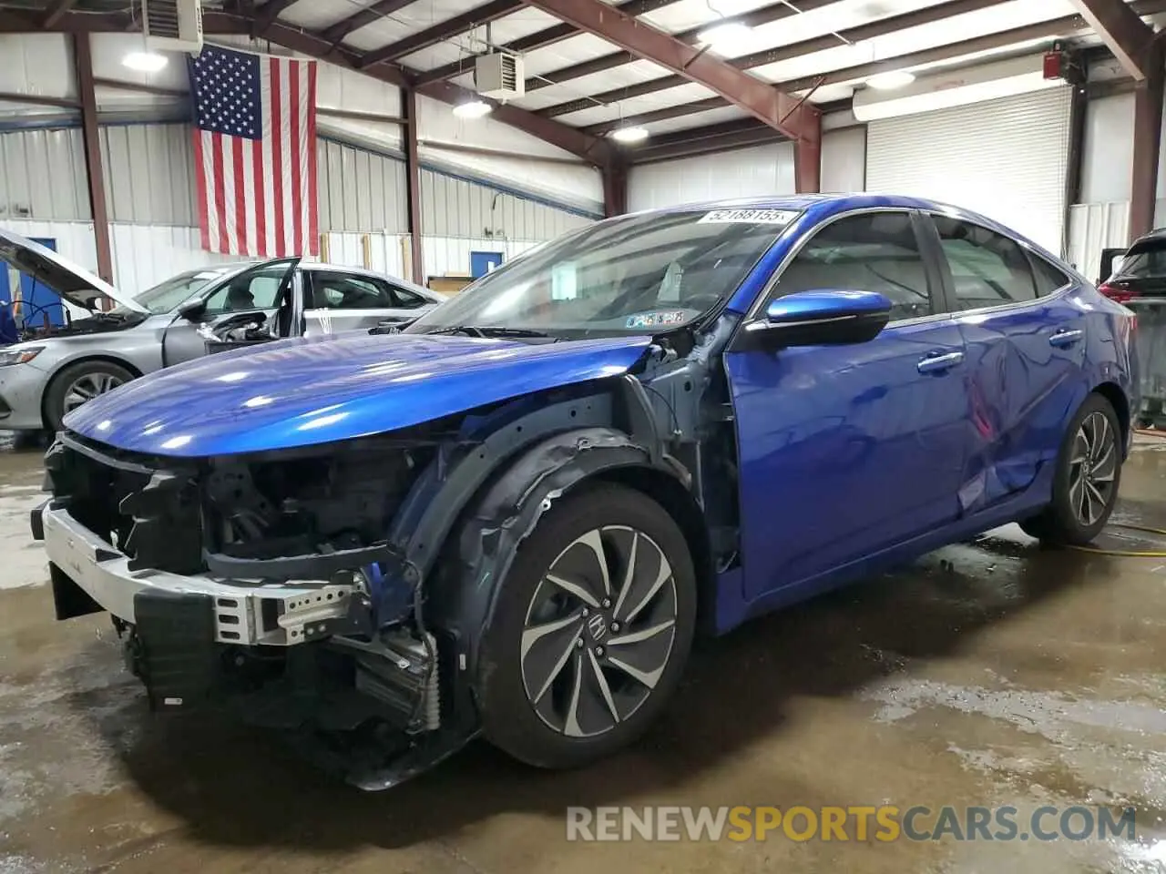 1 Фотография поврежденного автомобиля 19XZE4F90KE003576 HONDA INSIGHT 2019
