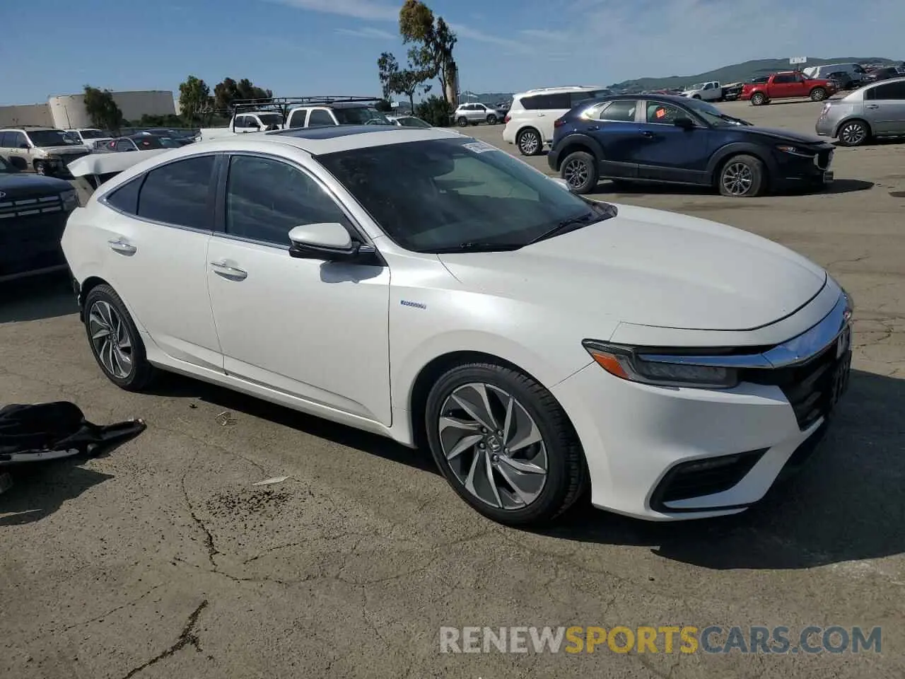4 Photograph of a damaged car 19XZE4F97KE020228 HONDA INSIGHT 2019