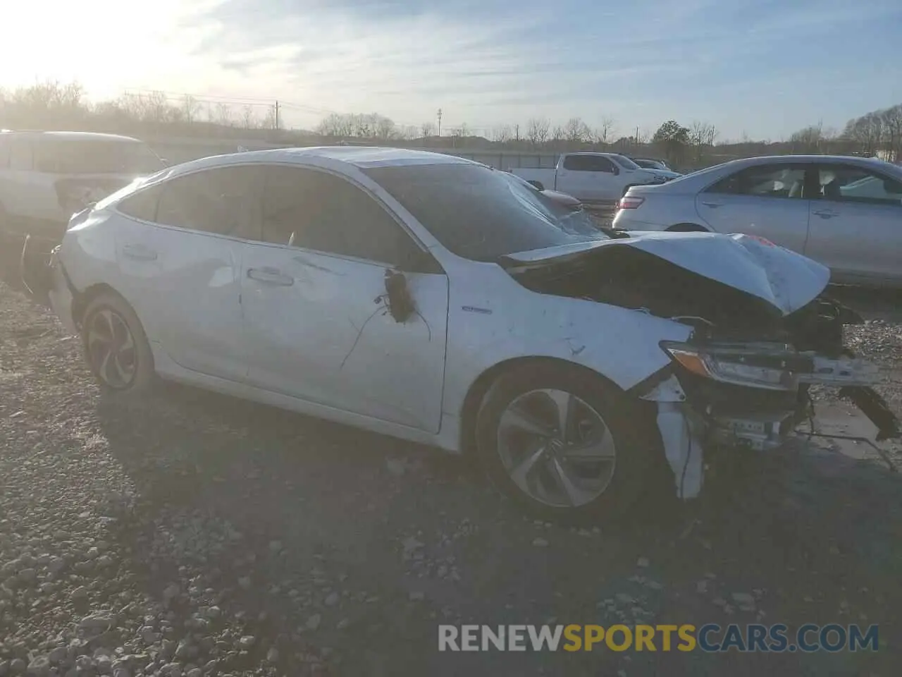 4 Photograph of a damaged car 19XZE4F53LE009595 HONDA INSIGHT 2020