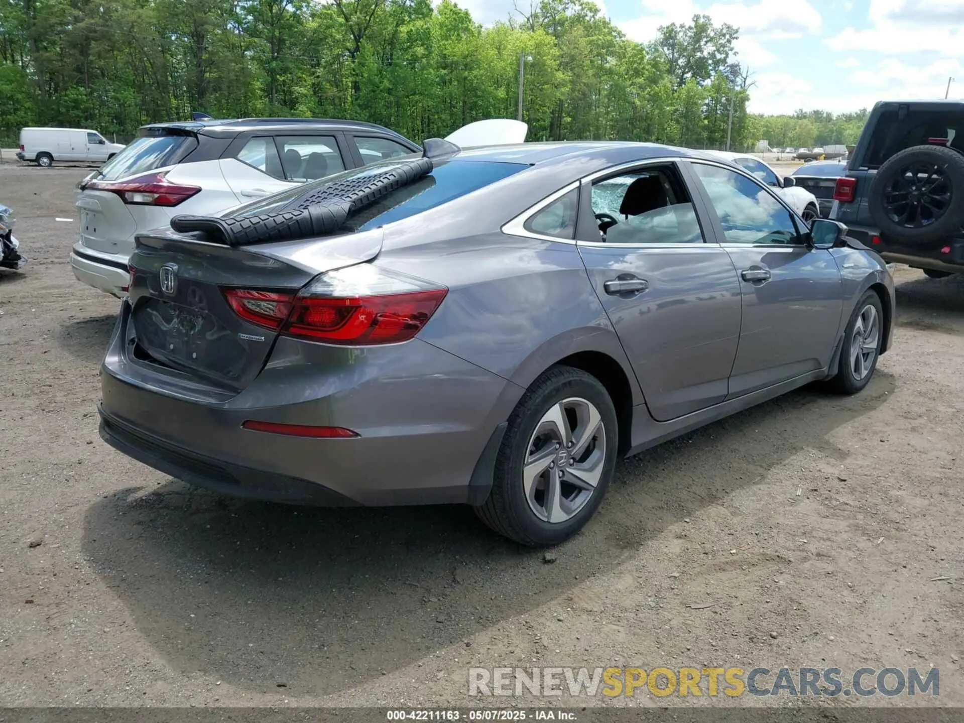 4 Photograph of a damaged car 19XZE4F57LE014721 HONDA INSIGHT 2020
