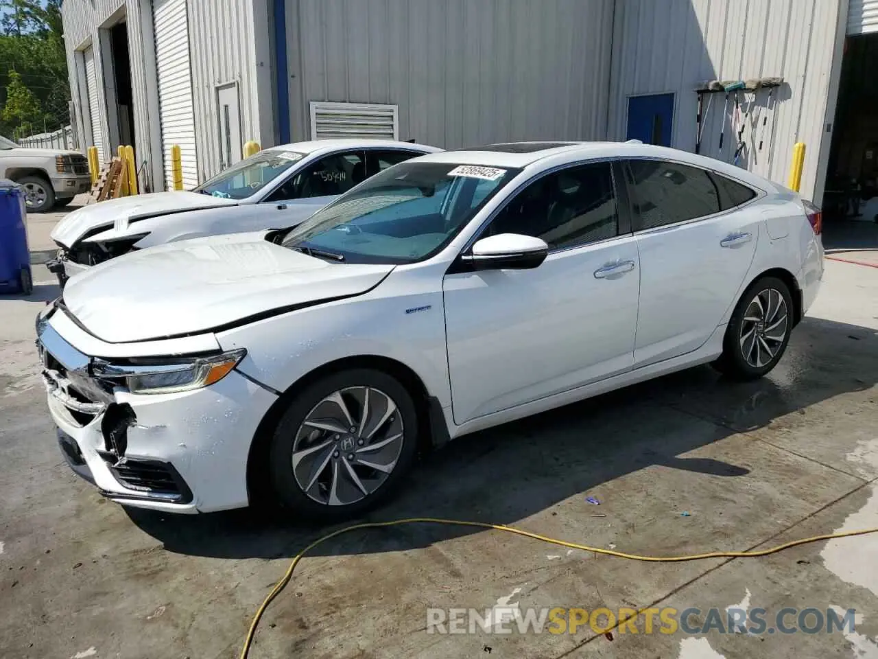 1 Photograph of a damaged car 19XZE4F90LE011002 HONDA INSIGHT 2020