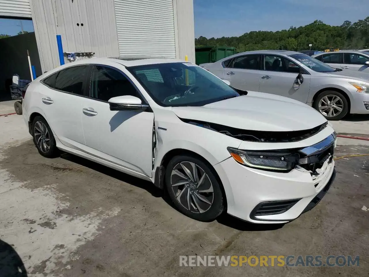 4 Photograph of a damaged car 19XZE4F90LE011002 HONDA INSIGHT 2020