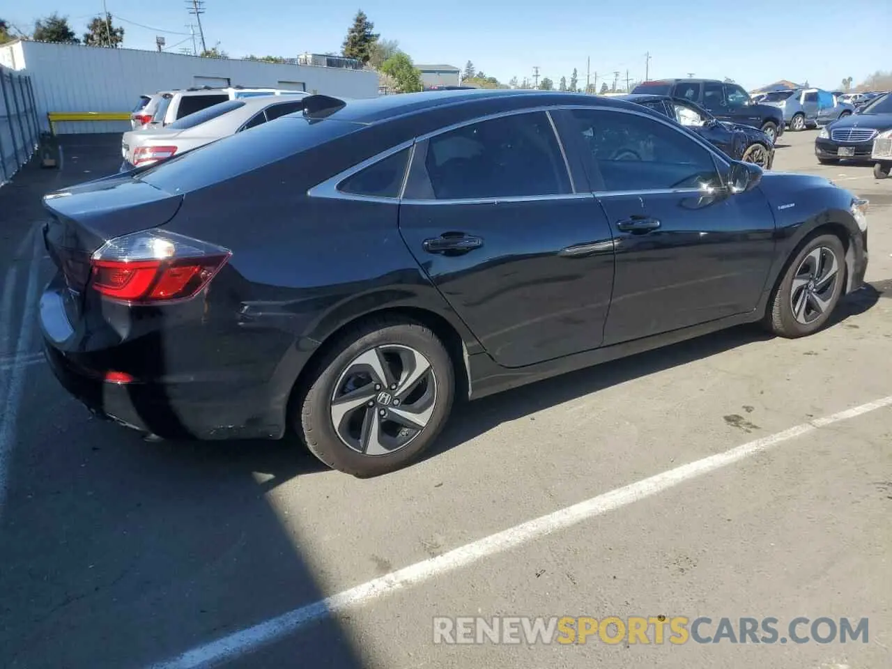 3 Фотография поврежденного автомобиля 19XZE4F52NE004911 HONDA INSIGHT 2022