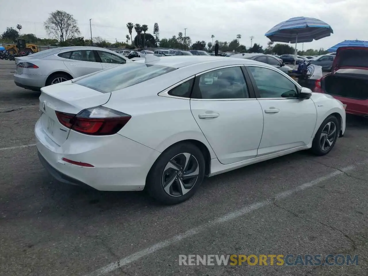 3 Фотография поврежденного автомобиля 19XZE4F52NE014032 HONDA INSIGHT 2022