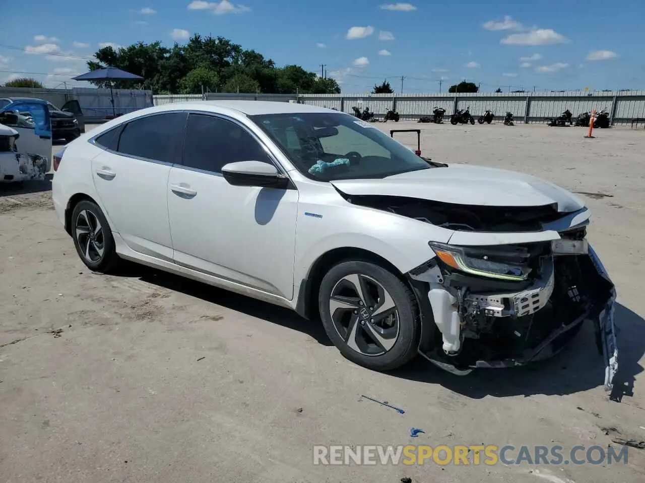 4 Photograph of a damaged car 19XZE4F55NE009889 HONDA INSIGHT 2022