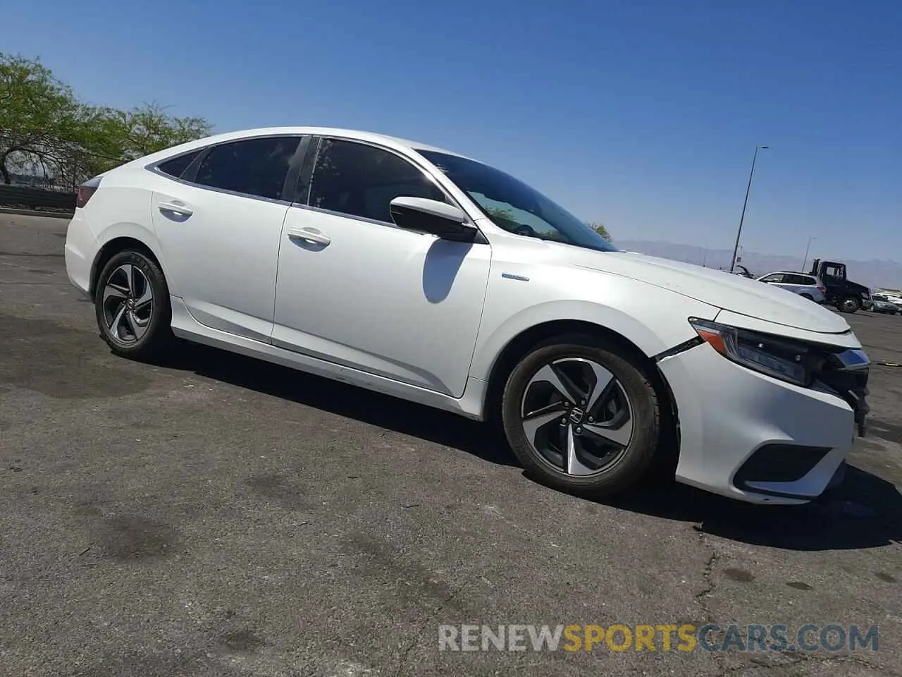 4 Photograph of a damaged car 19XZE4F56NE003261 HONDA INSIGHT 2022
