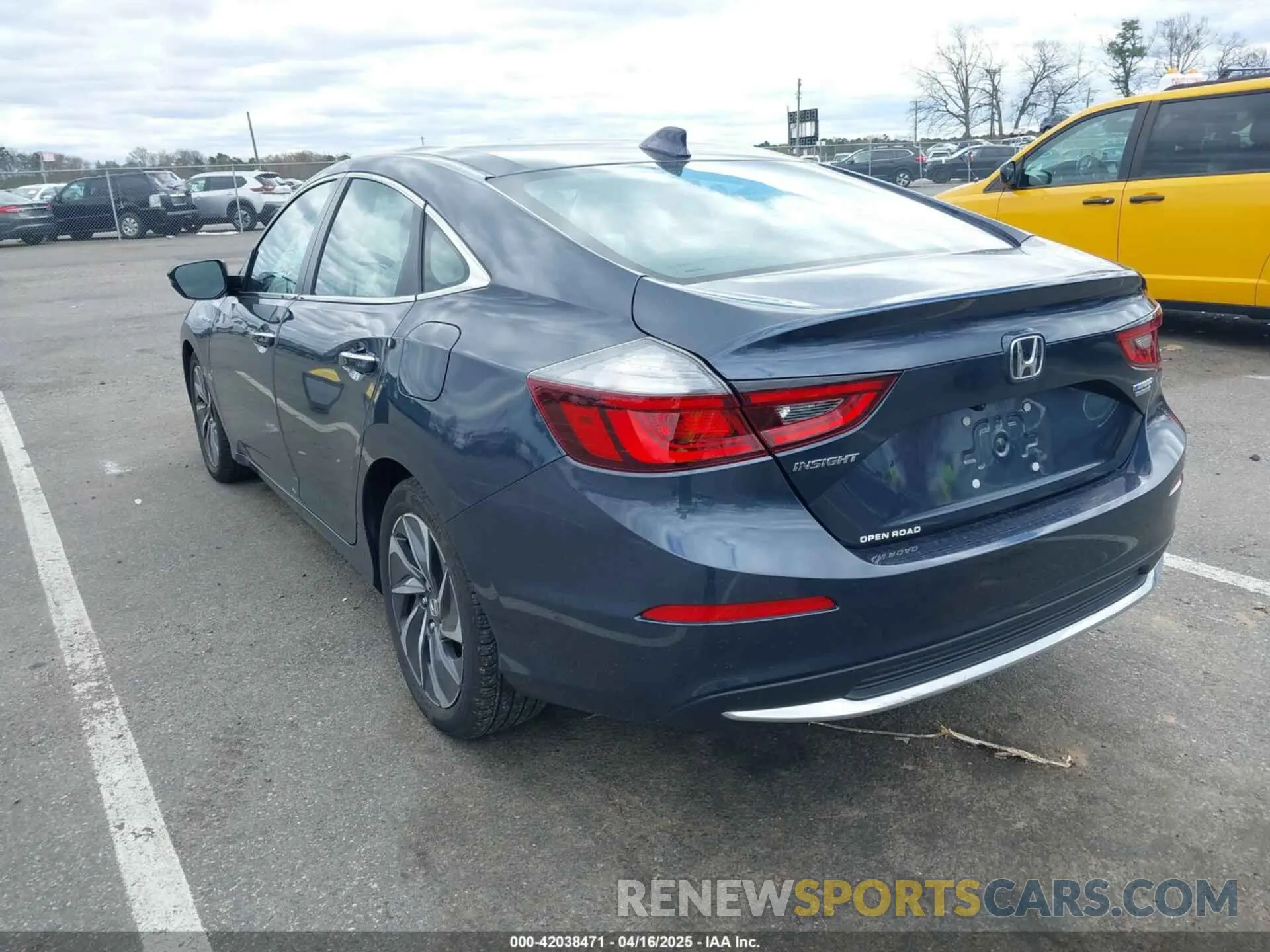 3 Фотография поврежденного автомобиля 19XZE4F90NE007552 HONDA INSIGHT 2022