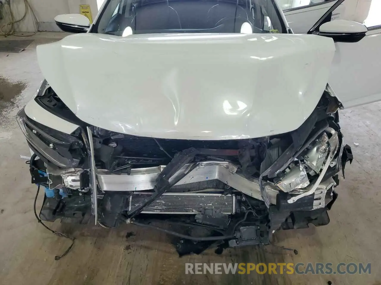 12 Photograph of a damaged car 19XZE4F94NE015248 HONDA INSIGHT 2022