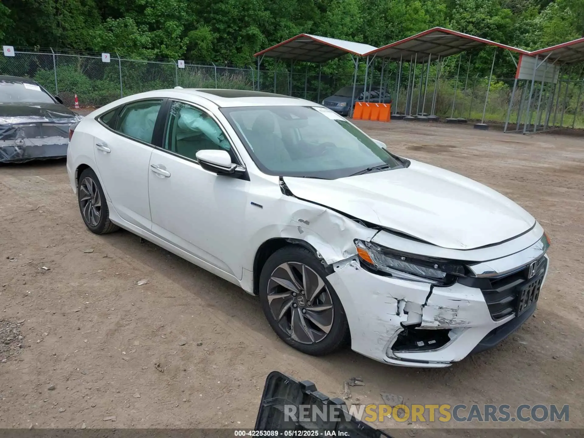 1 Photograph of a damaged car 19XZE4F95NE004694 HONDA INSIGHT 2022
