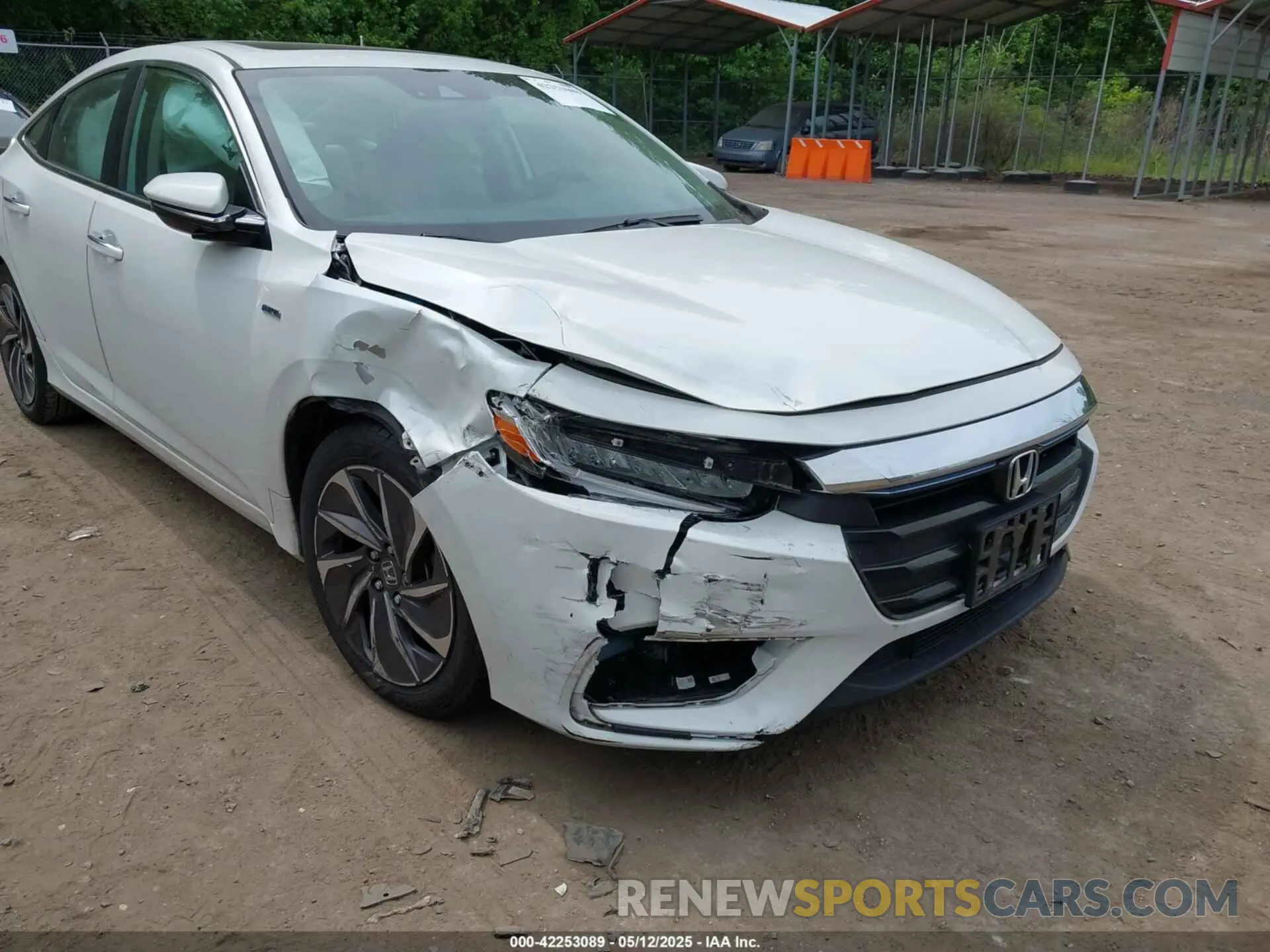 6 Photograph of a damaged car 19XZE4F95NE004694 HONDA INSIGHT 2022