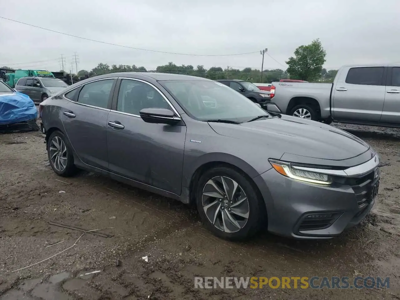 4 Photograph of a damaged car 19XZE4F98NE005192 HONDA INSIGHT 2022