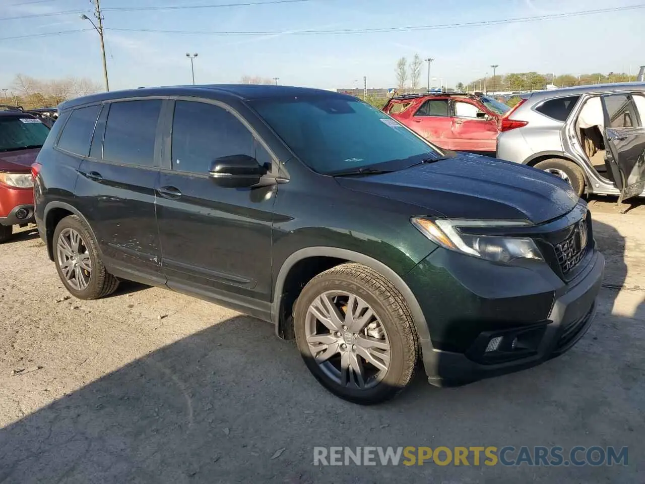 4 Photograph of a damaged car 5FNYF7H56KB003404 HONDA PASSPORT 2019