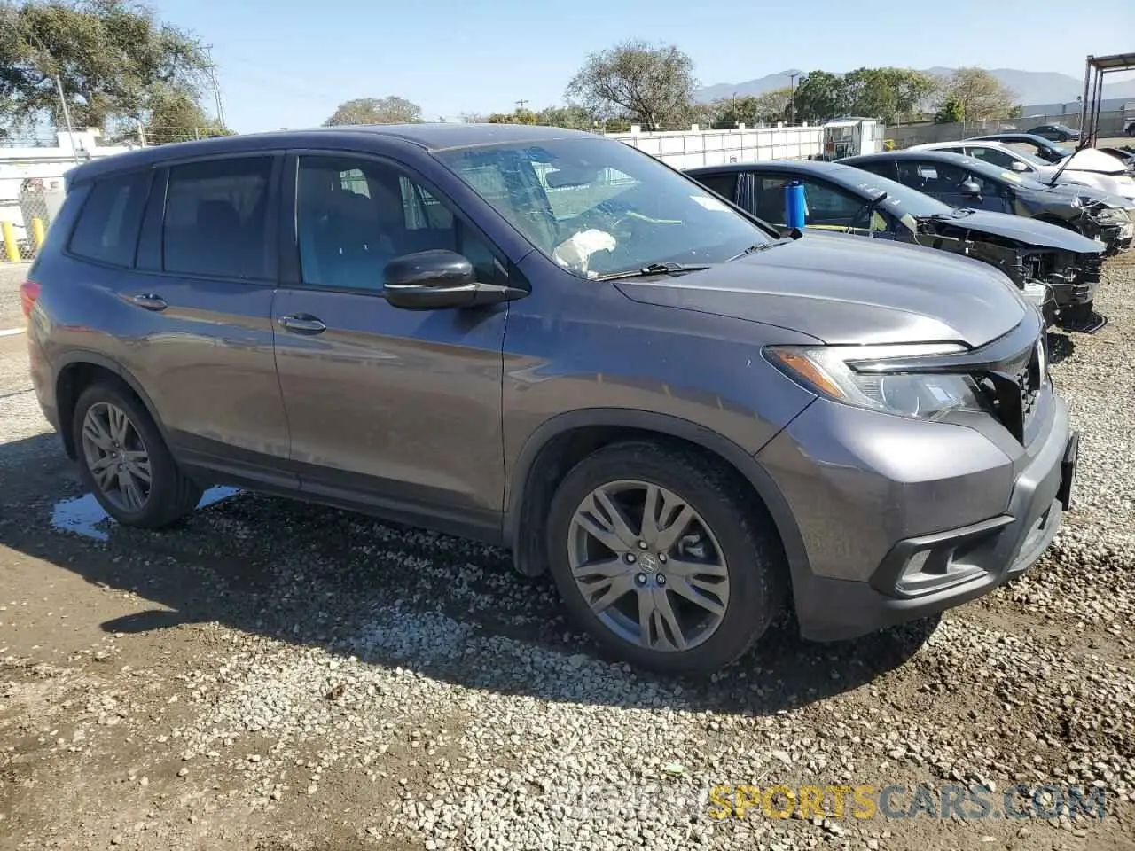 4 Photograph of a damaged car 5FNYF7H58KB003906 HONDA PASSPORT 2019