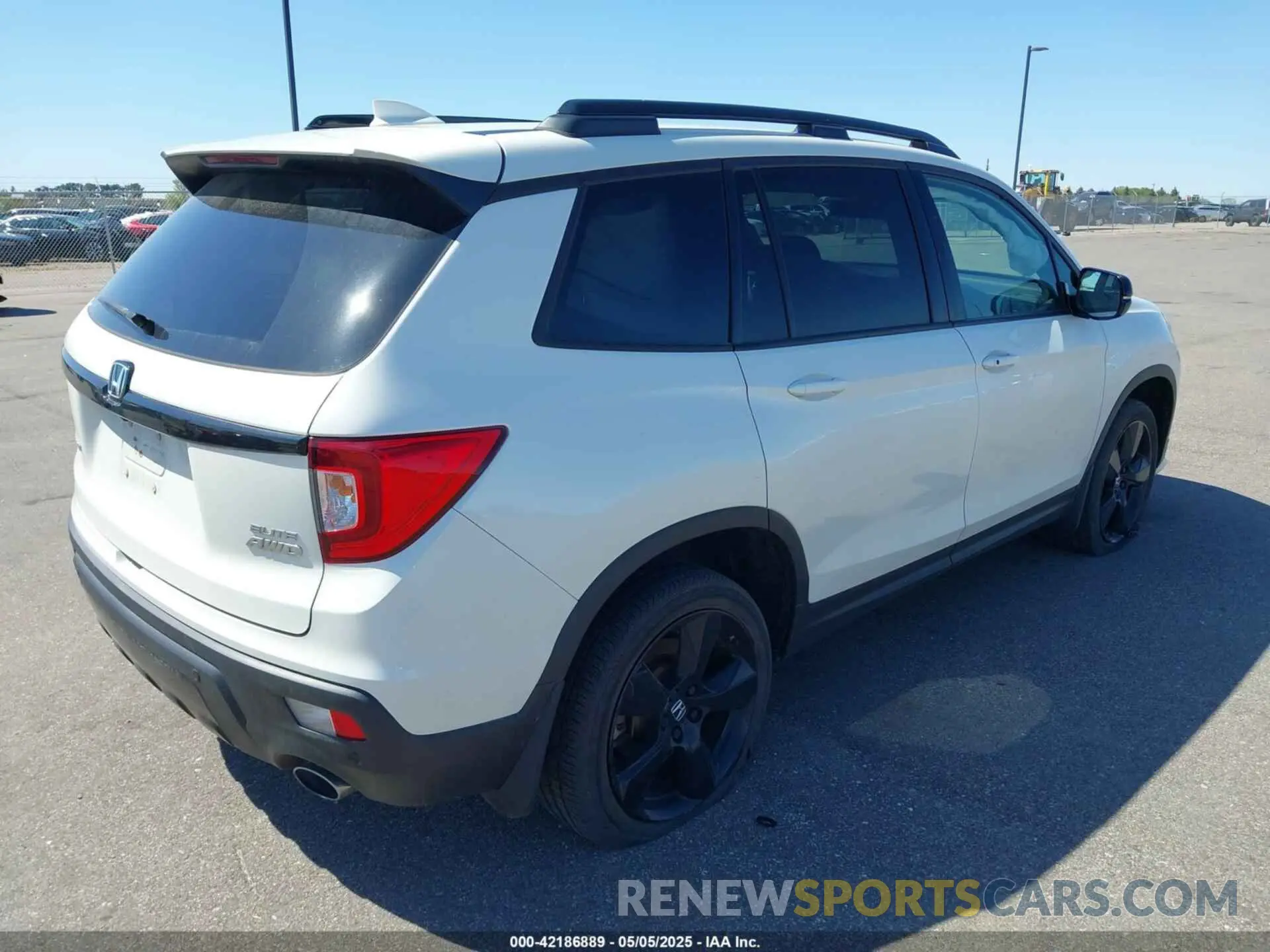 4 Photograph of a damaged car 5FNYF8H00KB006986 HONDA PASSPORT 2019