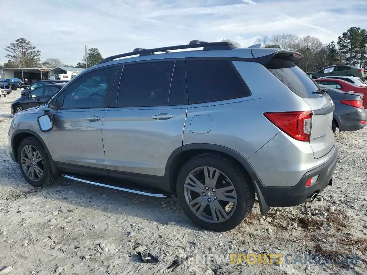 2 Photograph of a damaged car 5FNYF7H51LB000802 HONDA PASSPORT 2020