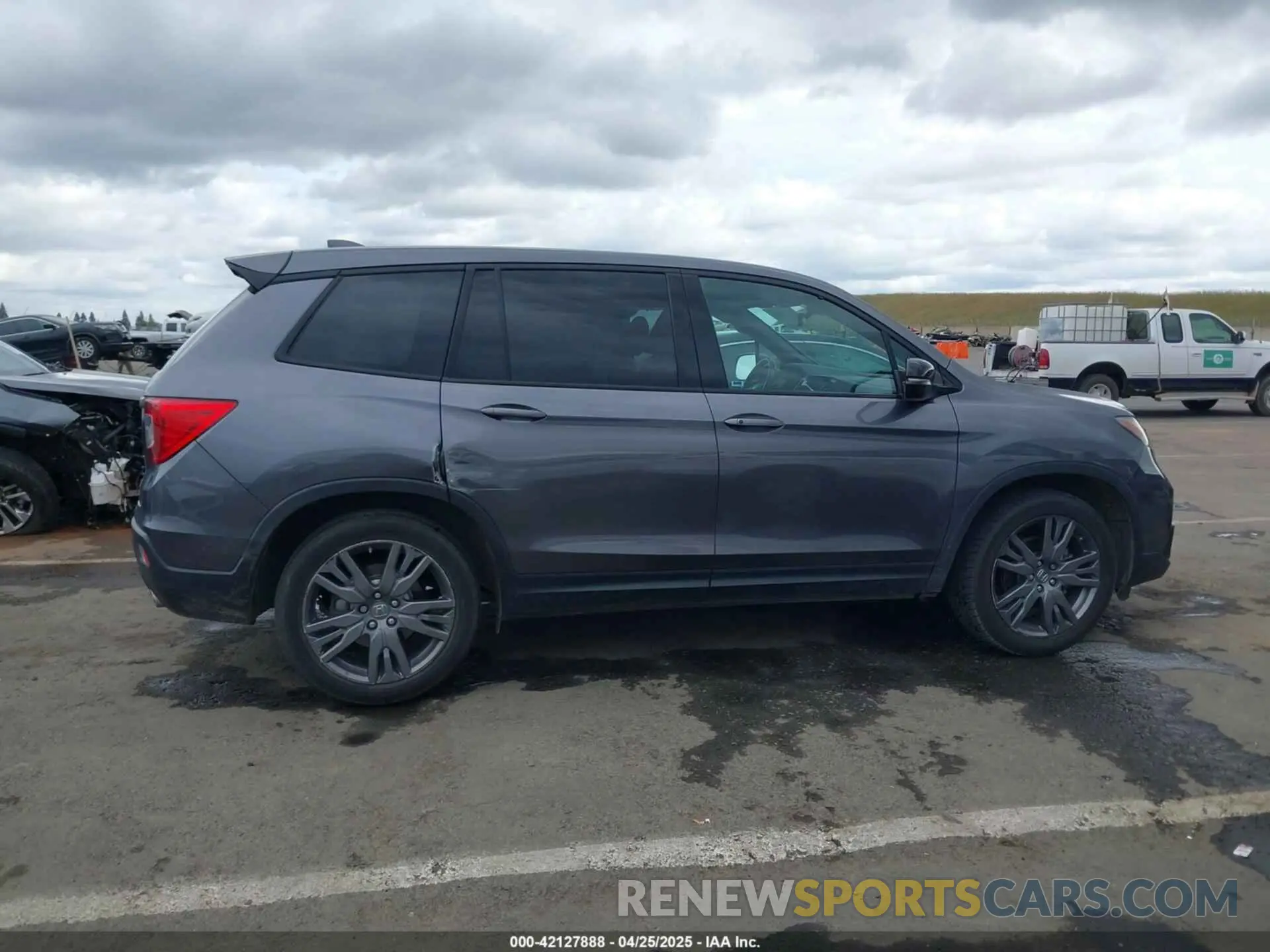 13 Photograph of a damaged car 5FNYF7H57LB000657 HONDA PASSPORT 2020