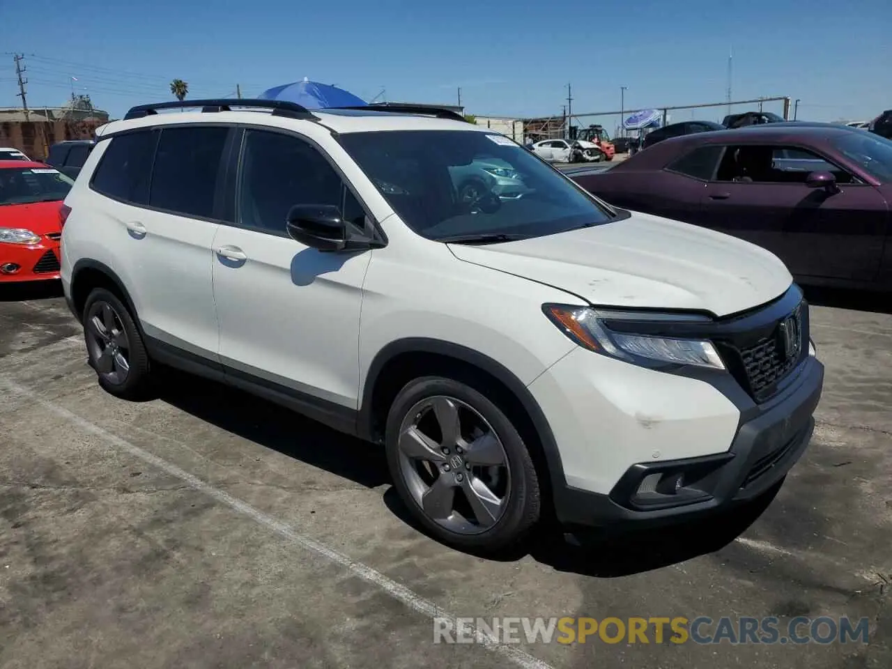 4 Фотография поврежденного автомобиля 5FNYF7H94LB005141 HONDA PASSPORT 2020