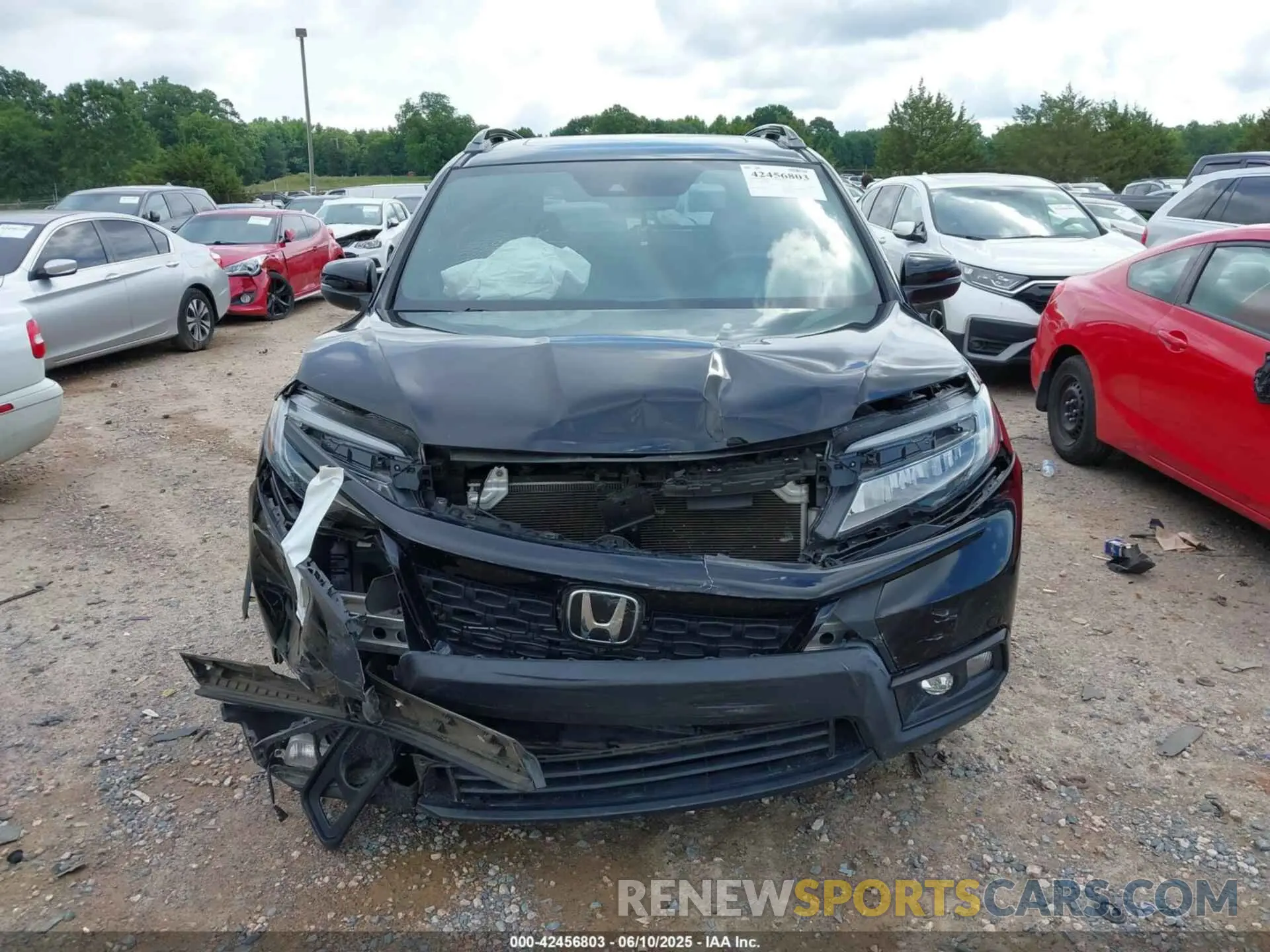 12 Photograph of a damaged car 5FNYF8H90LB005594 HONDA PASSPORT 2020